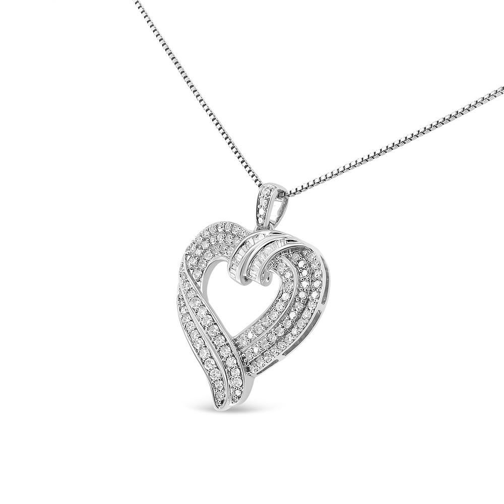 Delight her with this gorgeous diamond heart pendant. Created in sterling silver, this glamorous heart-shaped outline features a diamond-lined double ribbon sparkling between triple rows of diamonds. Ribbons of channel-set baguette-cut diamonds wrap