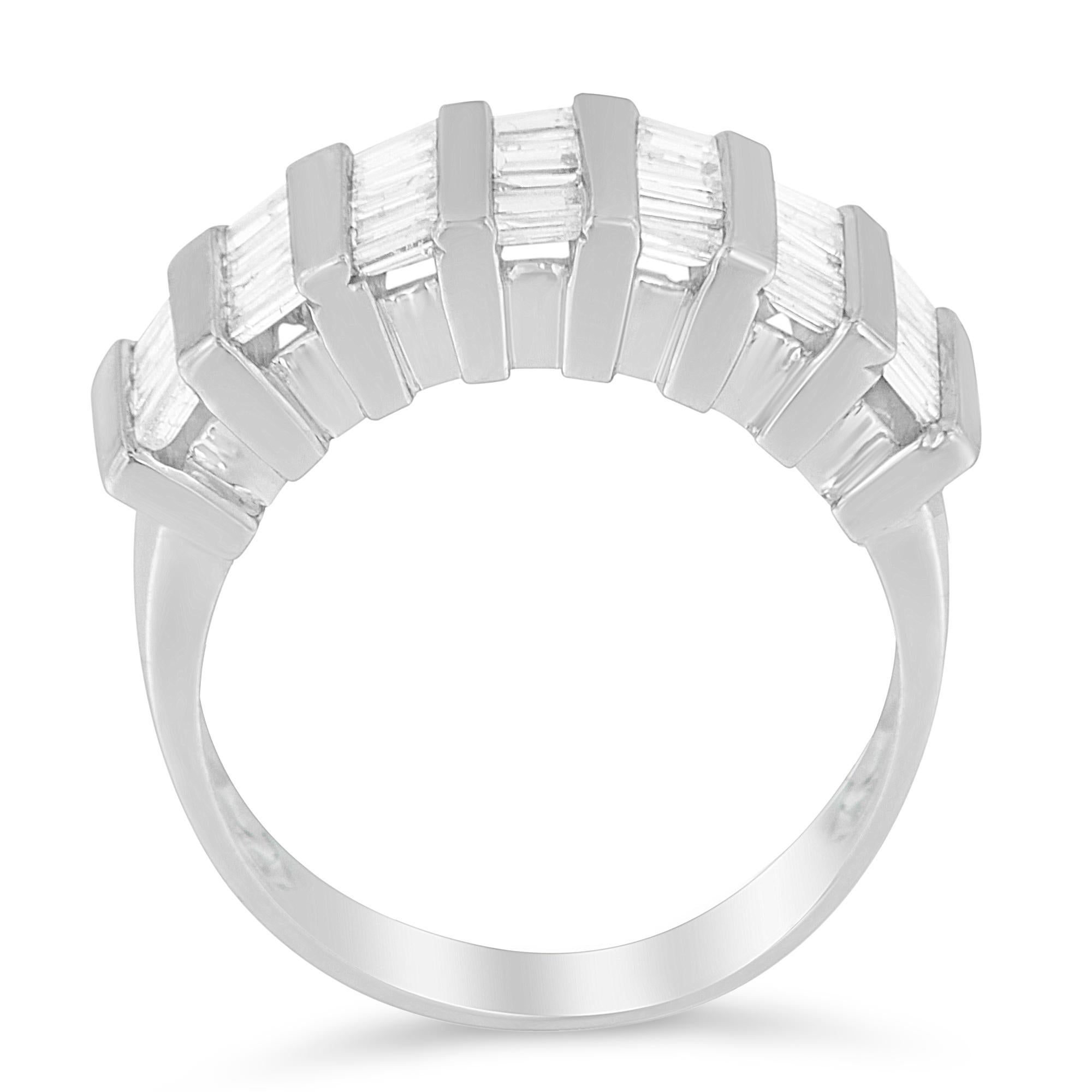 A unique multi-row diamond band ring that has a striking five rows of baguette diamonds set in cool sterling silver. The wide band has a total diamond weight of 1 carat.

'Video Available Upon Request'

Product features:

Diamond Type: Natural White
