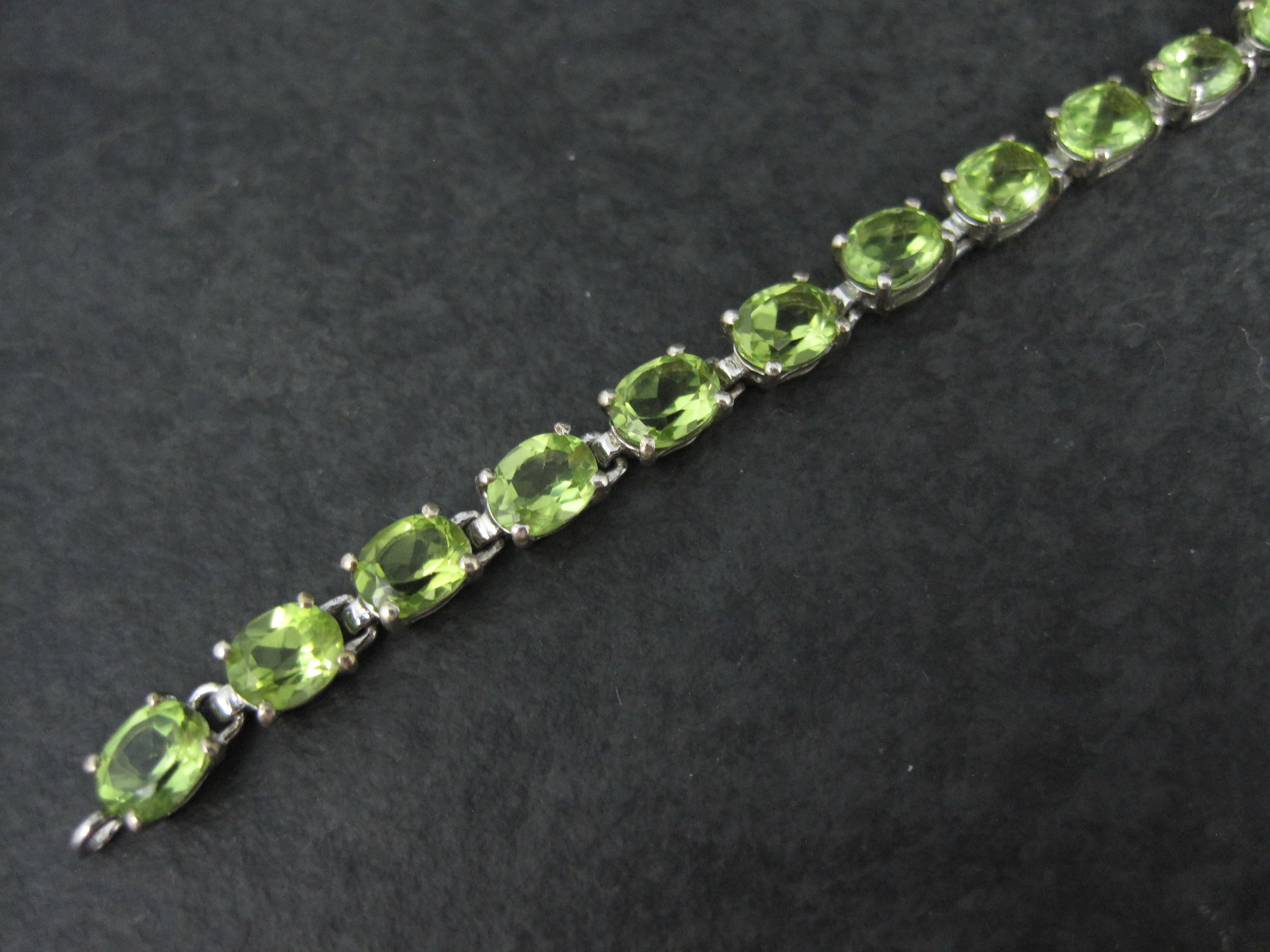 Oval Cut Sterling Silver 11.5 Carat Peridot Tennis Bracelet 7.5 Inches For Sale