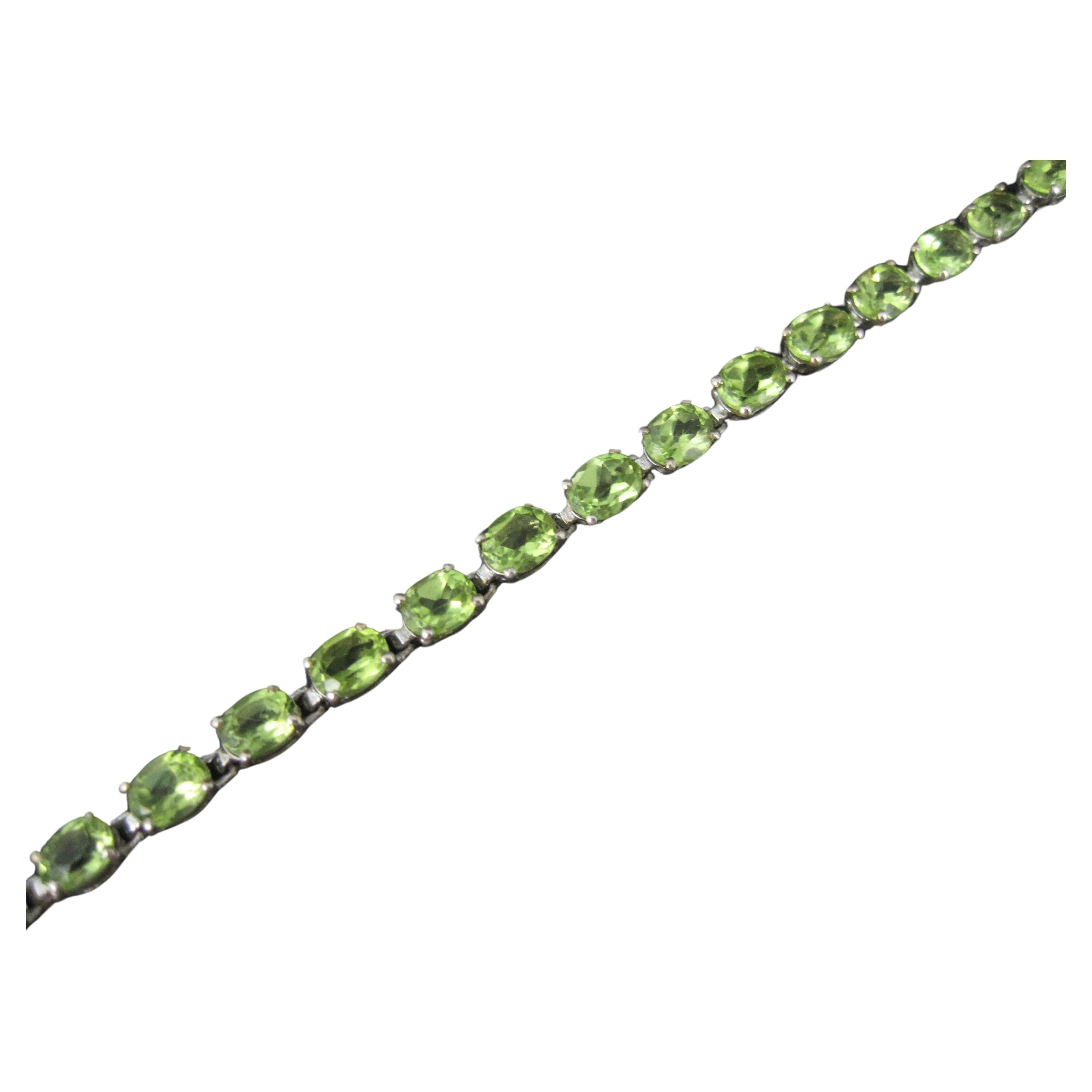 Sterling Silver 11.5 Carat Peridot Tennis Bracelet 7.5 Inches For Sale