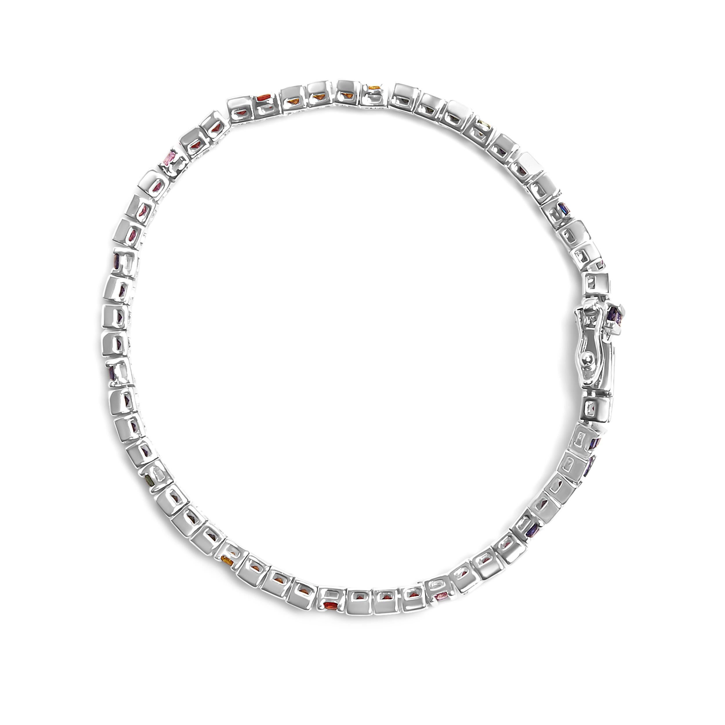 Introducing a mesmerizing masterpiece! Indulge in the allure of this .925 Sterling Silver Multi Colored Princess Cut Gemstone Link Tennis Bracelet. Crafted with love, this exquisite bracelet features 70 princess-cut sapphire gemstones in vibrant