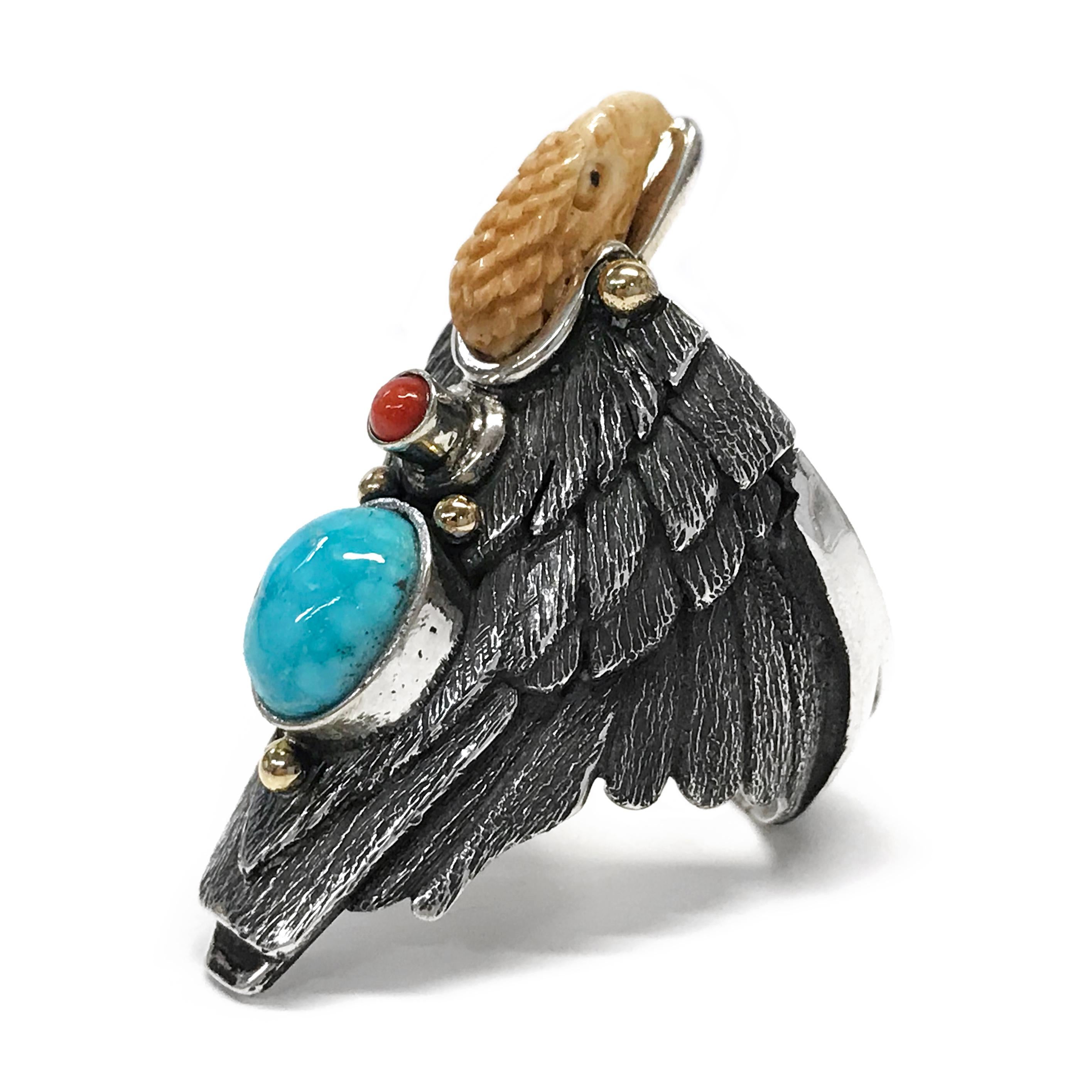 Handcrafted from Sterling Silver with 14k accents by jewelry maker, Ray Winner. This absolutely glorious ring features a natural Blue Carico Lake Turquoise oval cabochon and Mediterranean Coral round cabochon bezel set. The form of the ring band is