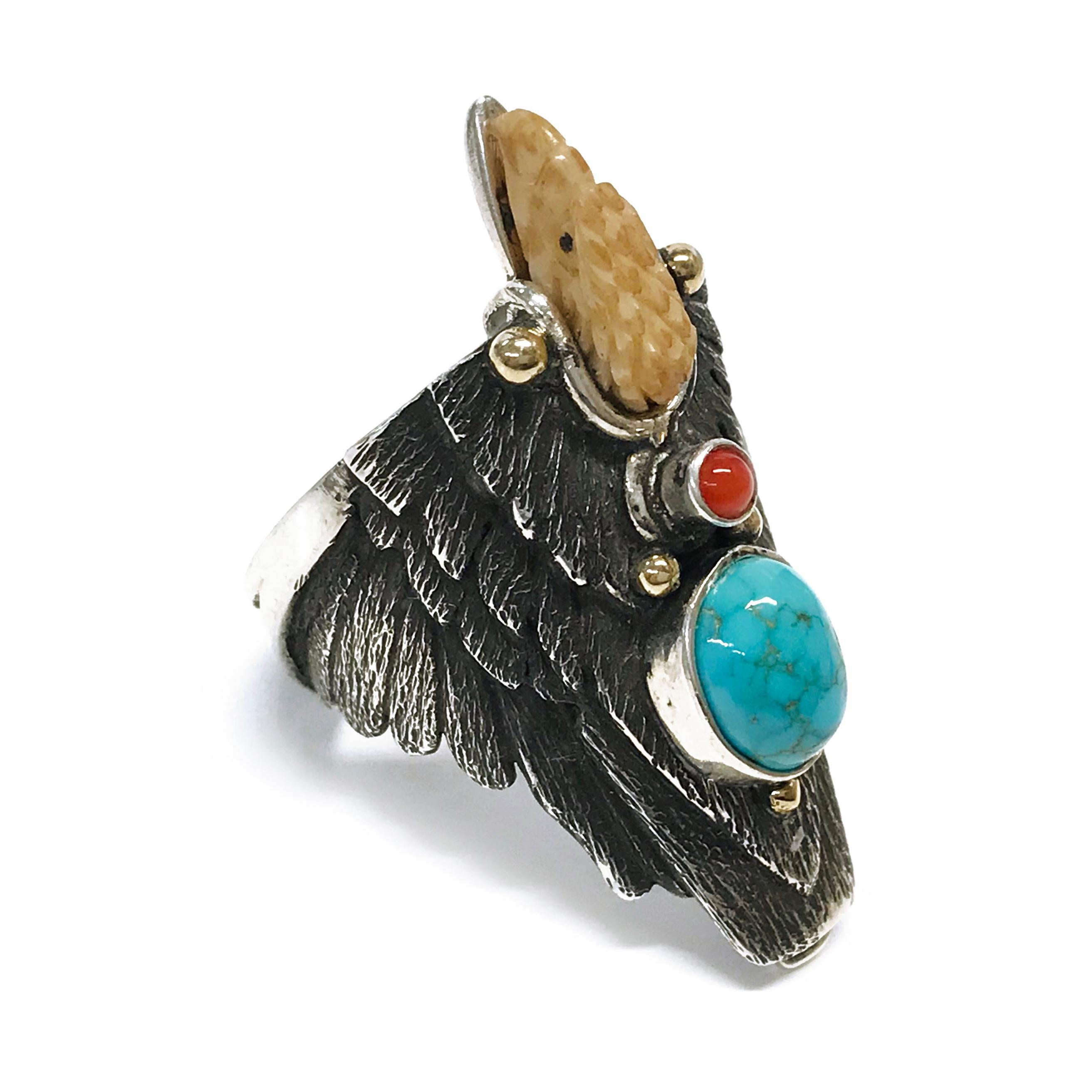 Handcrafted from Sterling Silver with 14k accents by jewelry maker, Ray Winner. This absolutely glorious ring features a natural Blue Carico Lake Turquoise oval cabochon and Mediterranean Coral round cabochon bezel set. The form of the ring band is