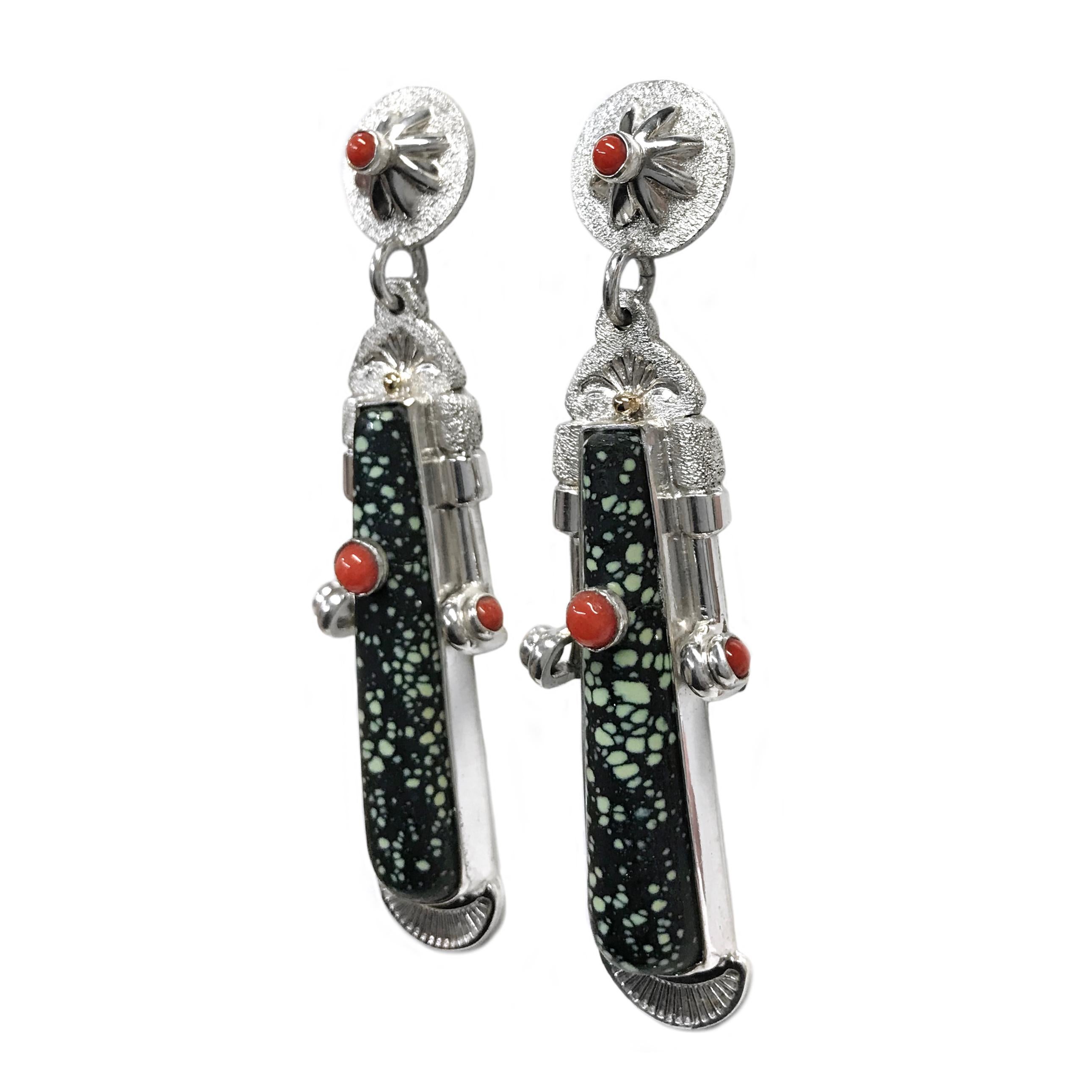 Handcrafted from Sterling Silver with 14k accents by jewelry maker, Ray Winner. These one-of-a-kind earrings feature a natural speckled New Lander Turquoise cabochon and Mediterranean Coral round cabochons. Two gold beads service as accent pieces on