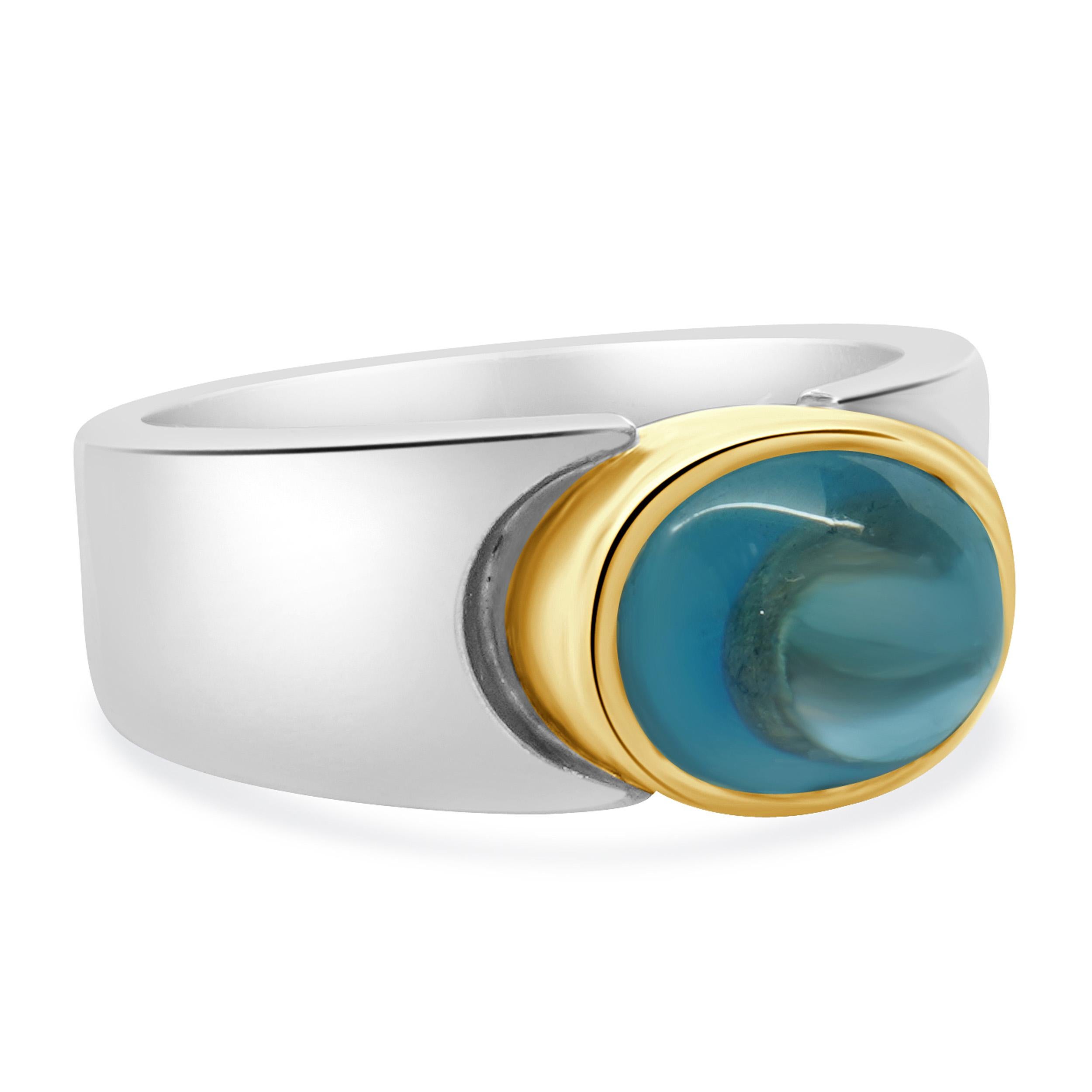 Designer: custom
Material: sterling silver & 14K yellow gold
Blue Topaz: 1 cabochon cut = 3.25ct
Ring Size: 7 (please allow two extra shipping days for sizing requests)
Weight: 8.19 grams


