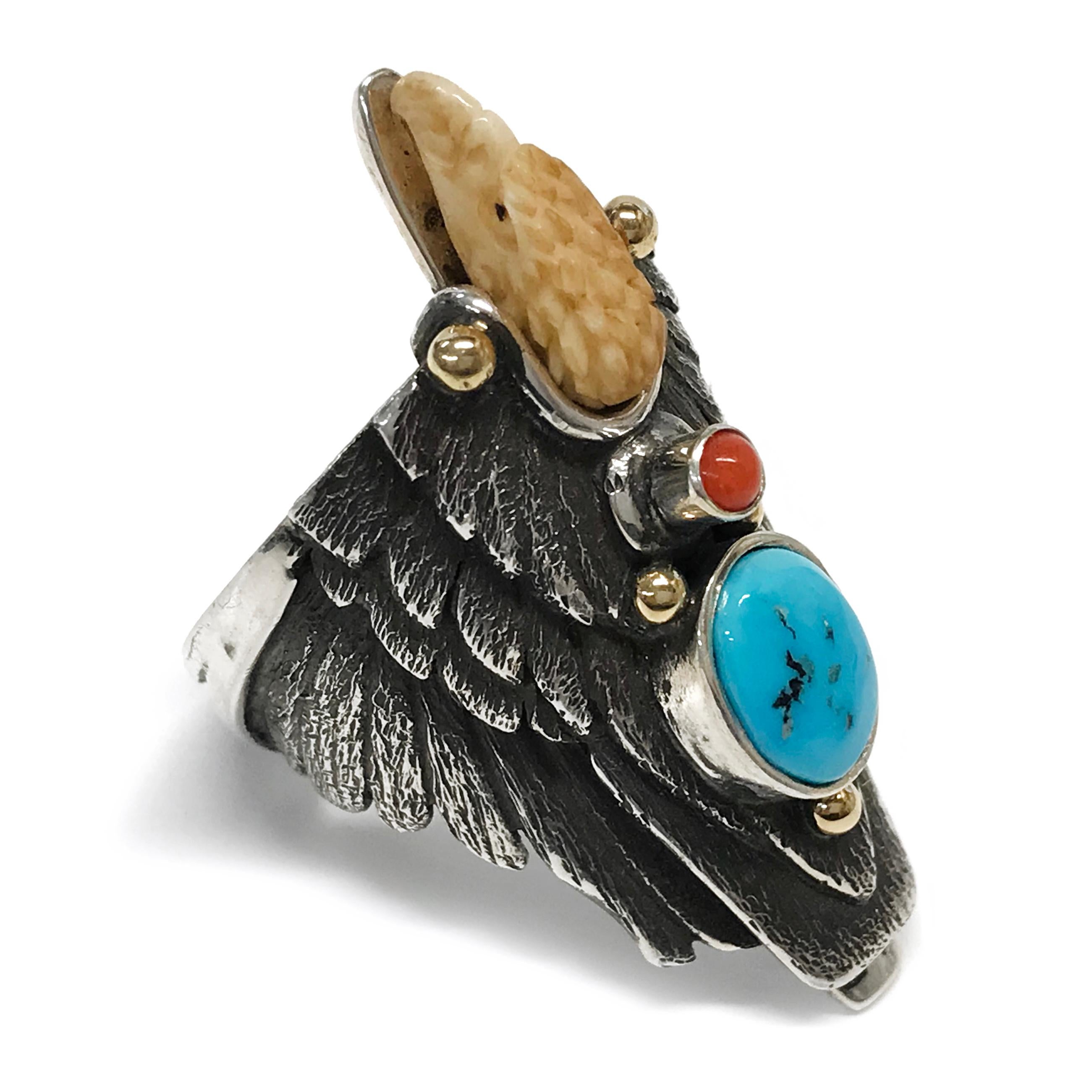 Handcrafted from Sterling Silver with 14k accents by jewelry maker, Ray Winner. This absolutely glorious ring features a natural Sleeping Beauty Turquoise oval cabochon and Mediterranean Coral round cabochon bezel set. The form of the ring band is