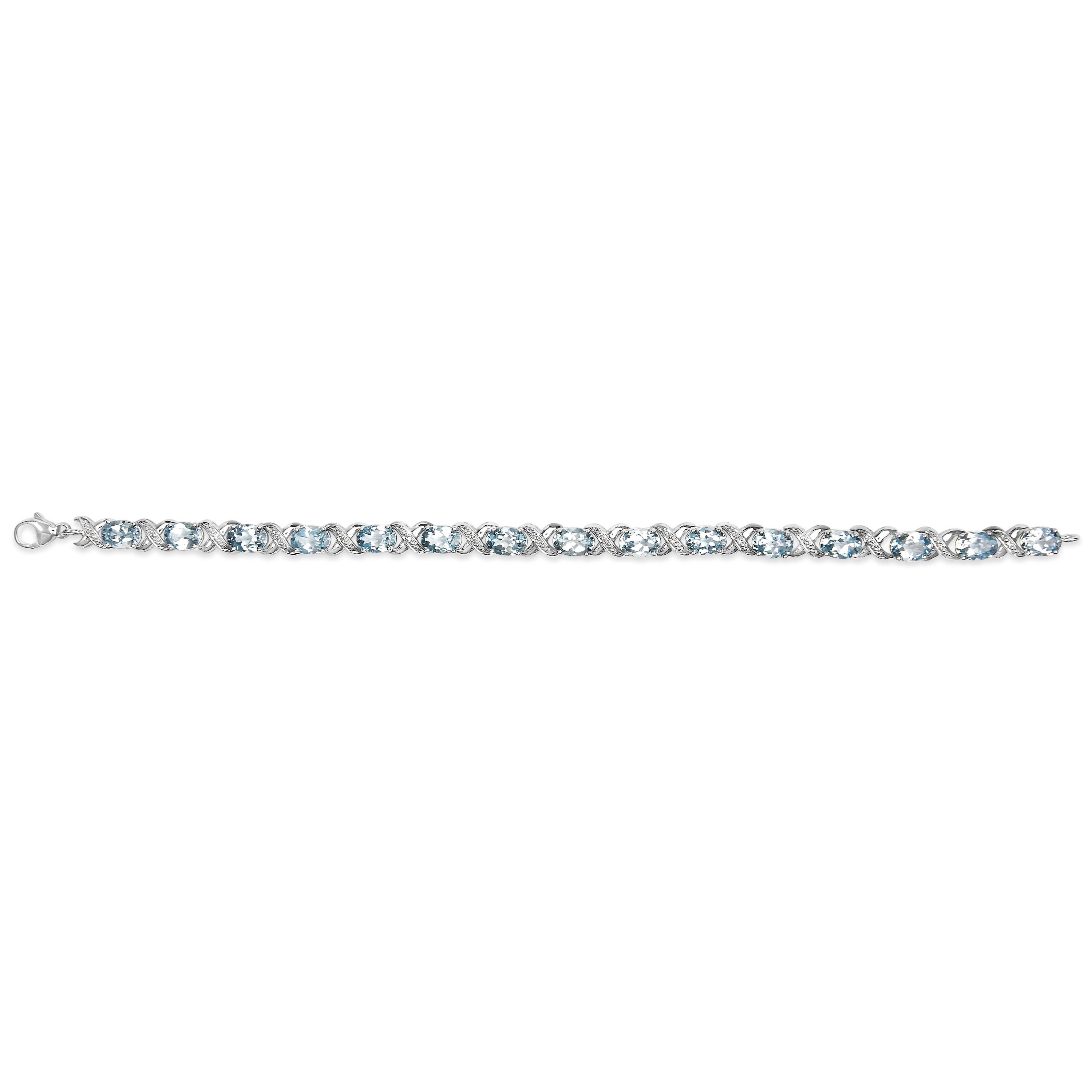 Modern Sterling Silver 16.0ct Oval Blue Topaz and Diamond Accent Tennis X Link Bracelet For Sale