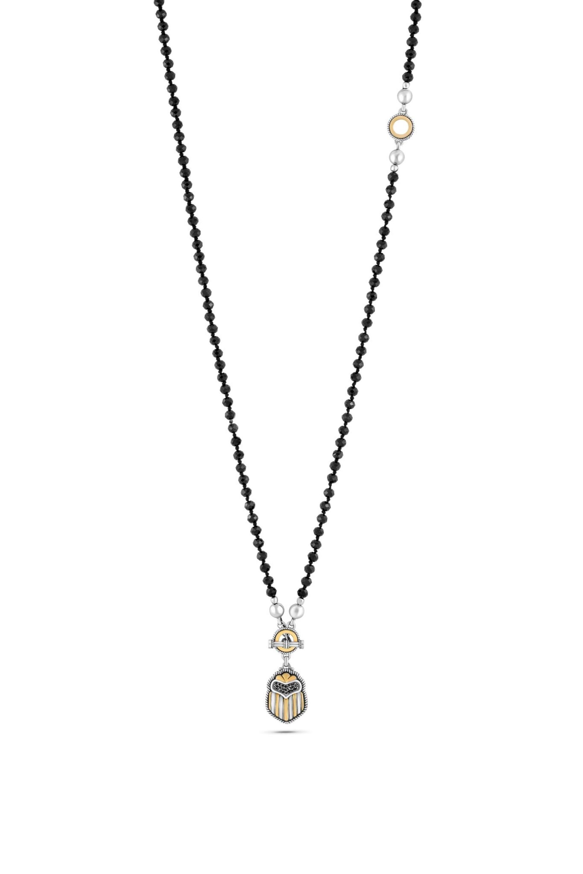 18 Karat Gold and Sterling Silver Multi-Wear Beaded Scarab Necklace adorned with diamonds, semi-precious and precious stones. The Necklace converts from Full length to a Lariat style via the signature T-Lock fastening.

Available Stone