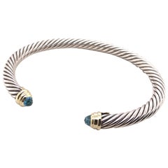 Sterling Silber:: 18 Karat Gelbgold David Yurman Manschettenarmband mit blauem Topas