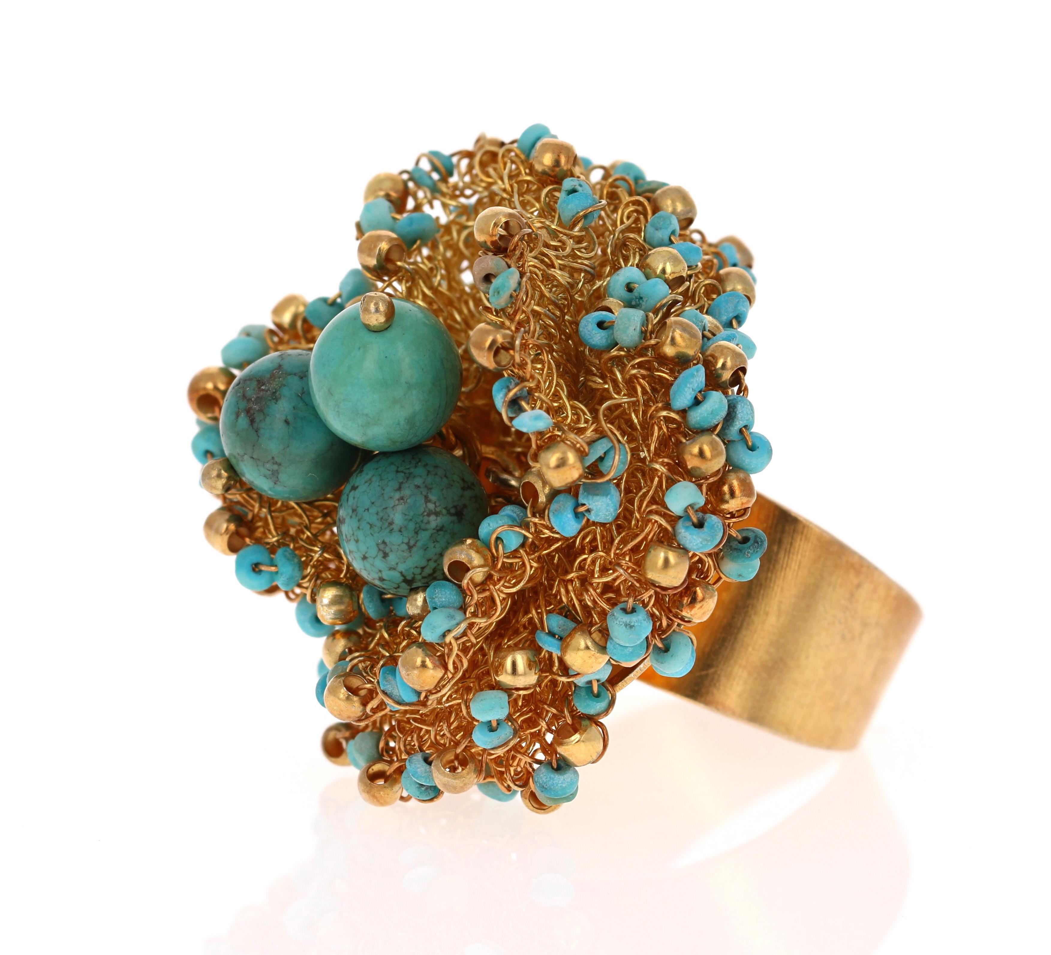 Stunning Turquoise Bead Ring - 925 Silver & 22Kt Gold Plated
Turkish Design - Hand crafted in Turkey
925 Stamp
One of a kind design
Ring Size is Adjustable