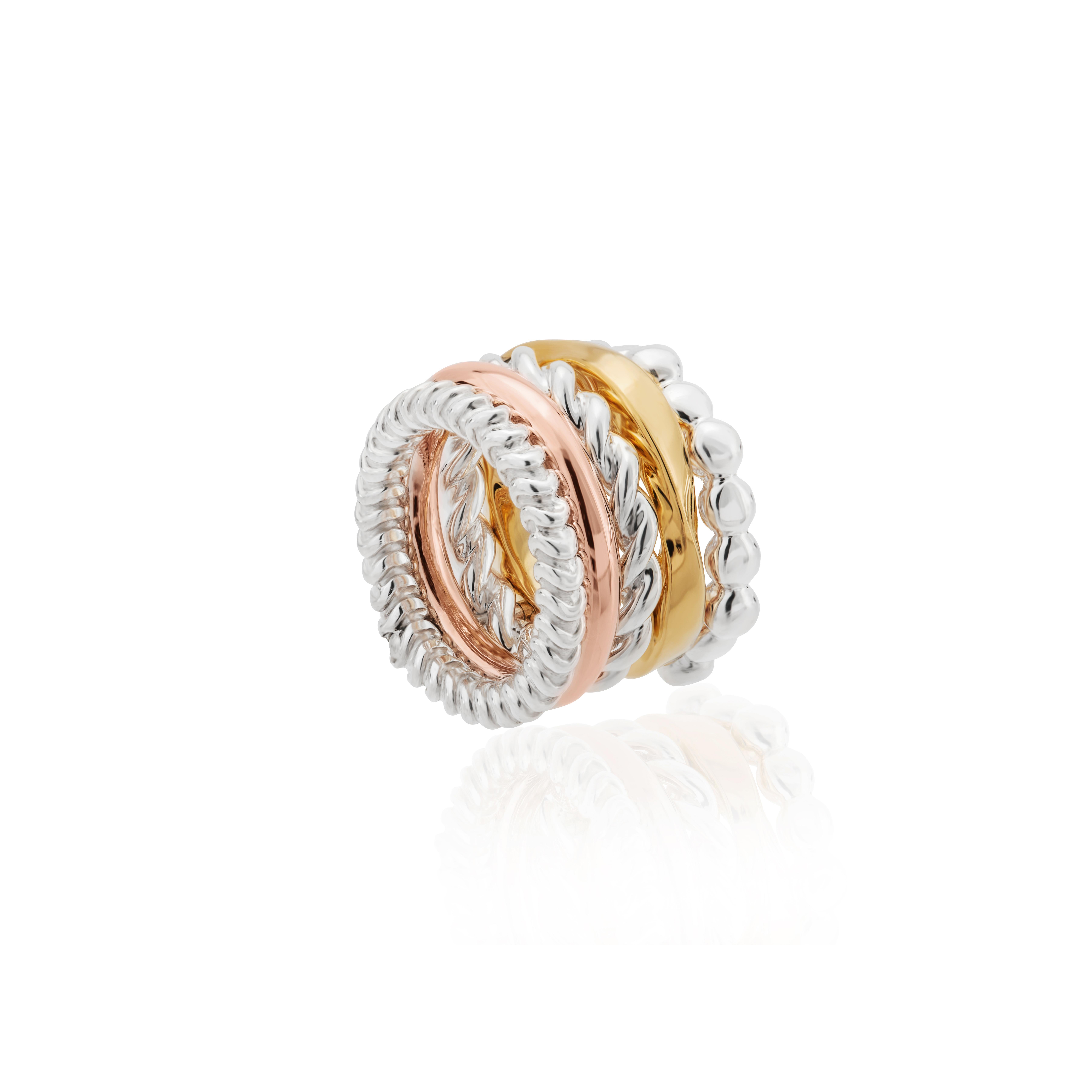 Fun and dynamism are brought together in this stunning  ring made up of five completely unique rings handmade in sterling silver, 23 karat vermeil & rose gold.

A stunning tribute to the churumbelas created by Pedro Leites, this new version of