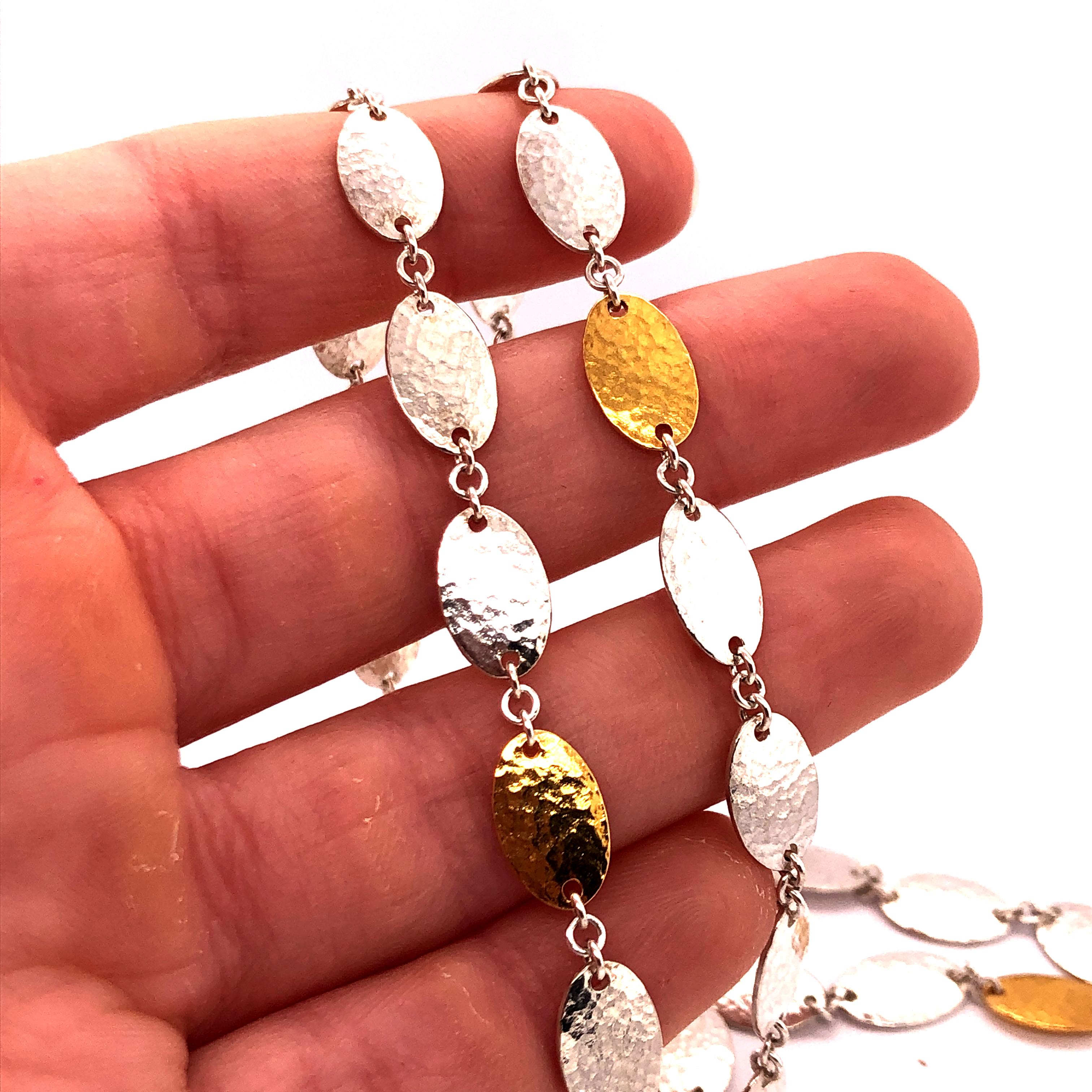 Sterling Silver & 24KY Mango Flake Necklace. 36 inches long.

Stamped: Gurhan, 925, 24k G. P.