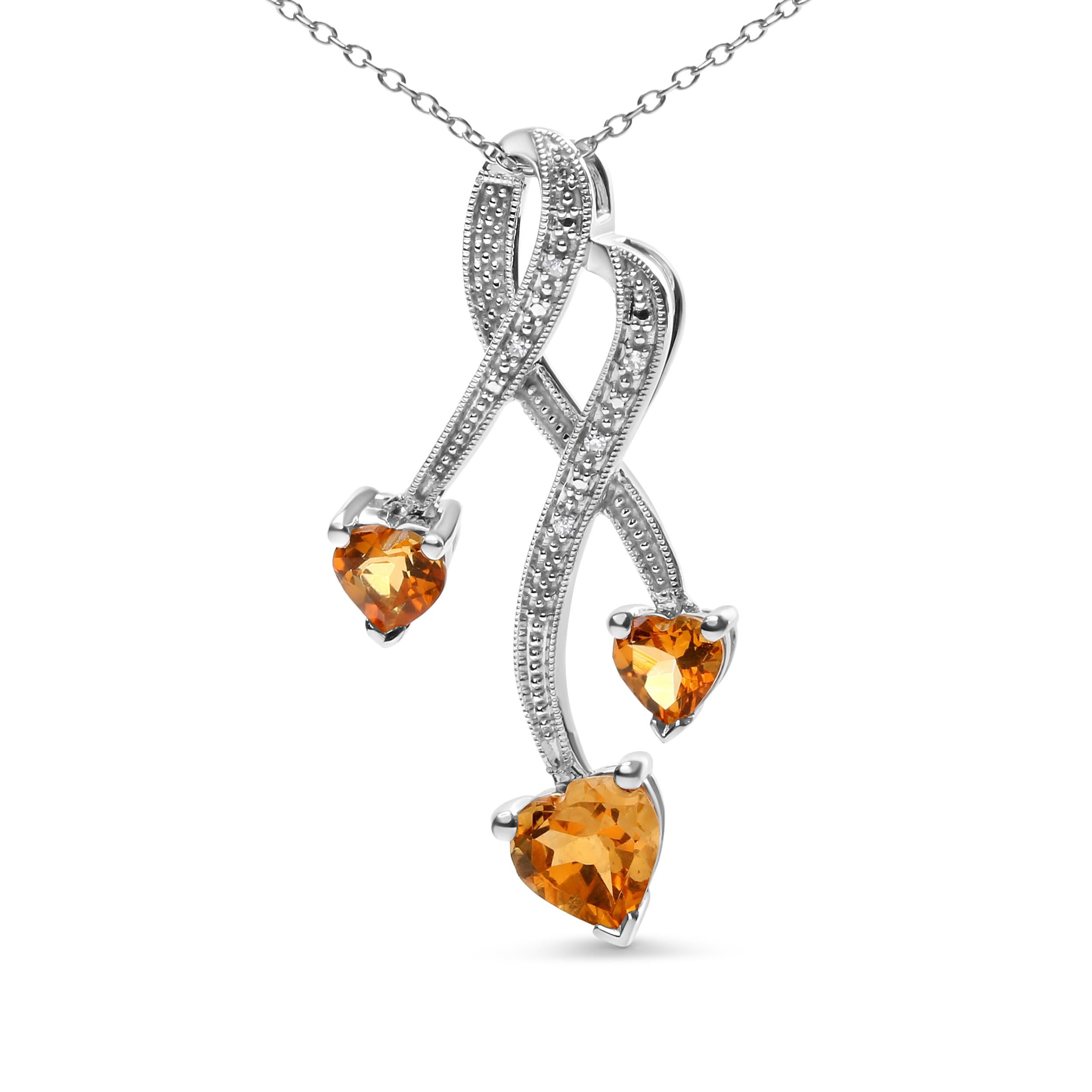 This stunning .925 sterling silver pendant necklace is the perfect way to add a touch of elegance and sophistication to any outfit. Featuring three natural heart-shaped yellow citrines, totaling 2.01 cttw, that have been heat-treated to achieve