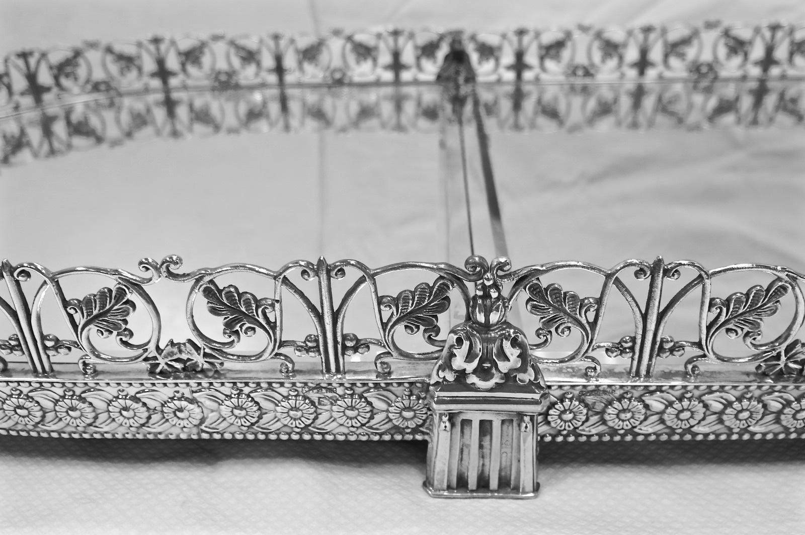 4 section, sterling silver table plateau with mirrored top. The 4 sections measure 65