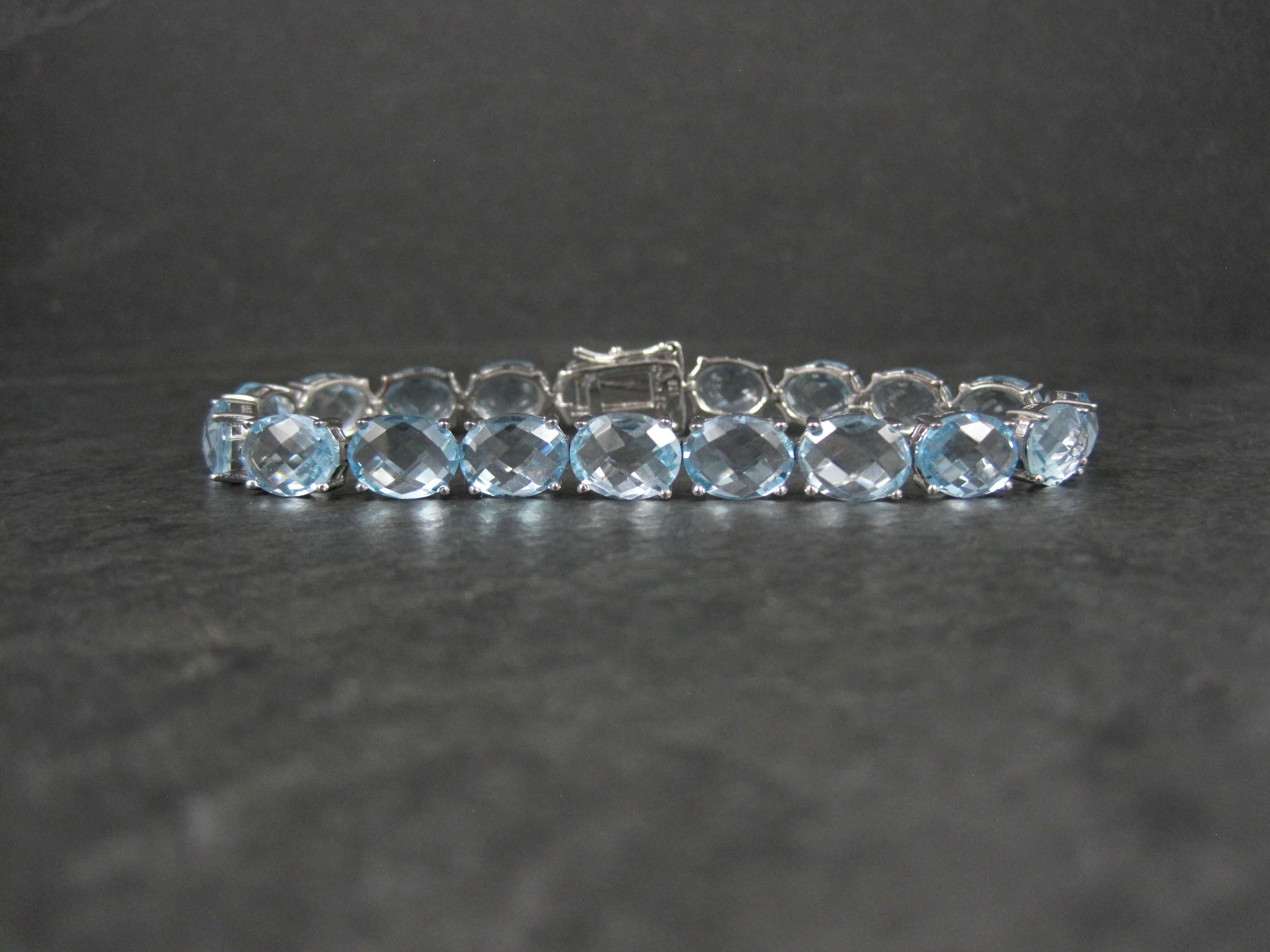 Pulsera de tenis de plata de ley con topacio azul de 45,6 quilates en venta 4