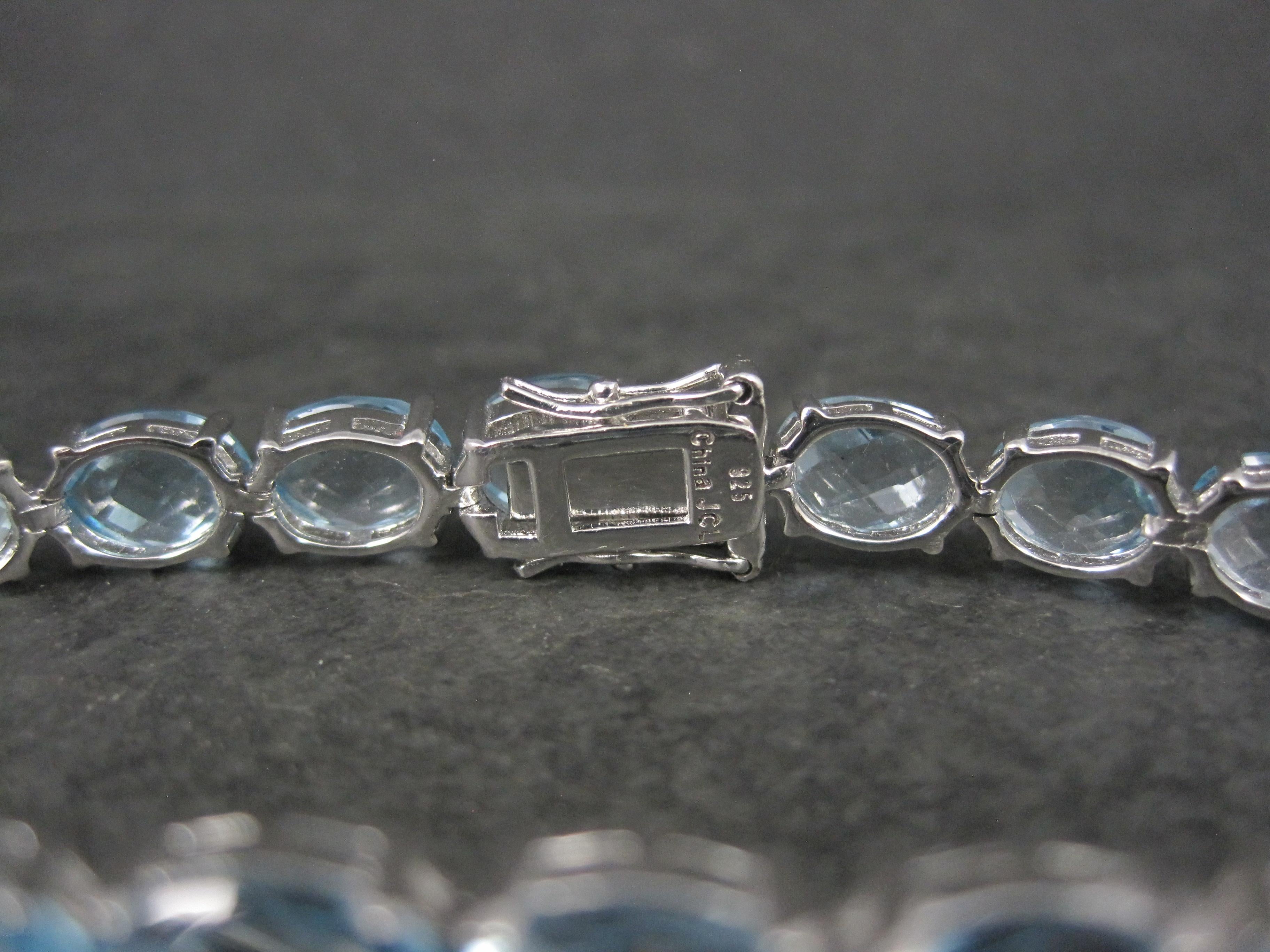 Pulsera de tenis de plata de ley con topacio azul de 45,6 quilates en venta 5
