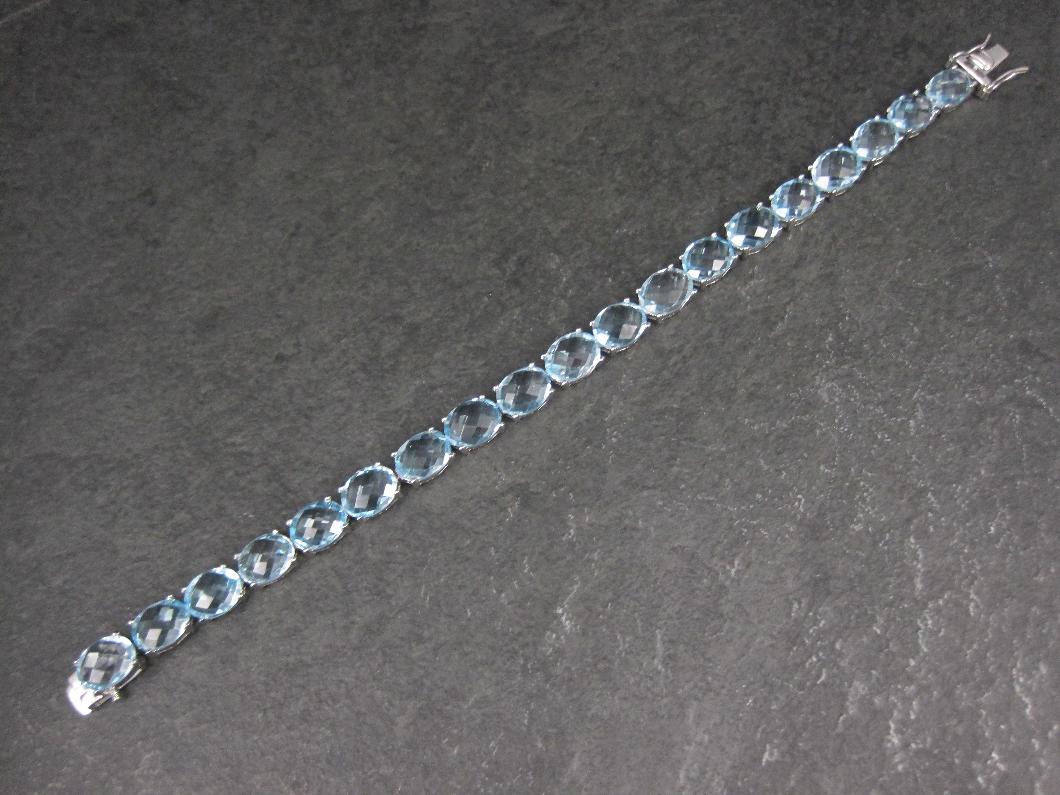 Pulsera de tenis de plata de ley con topacio azul de 45,6 quilates en Excelente estado para la venta en Webster, SD