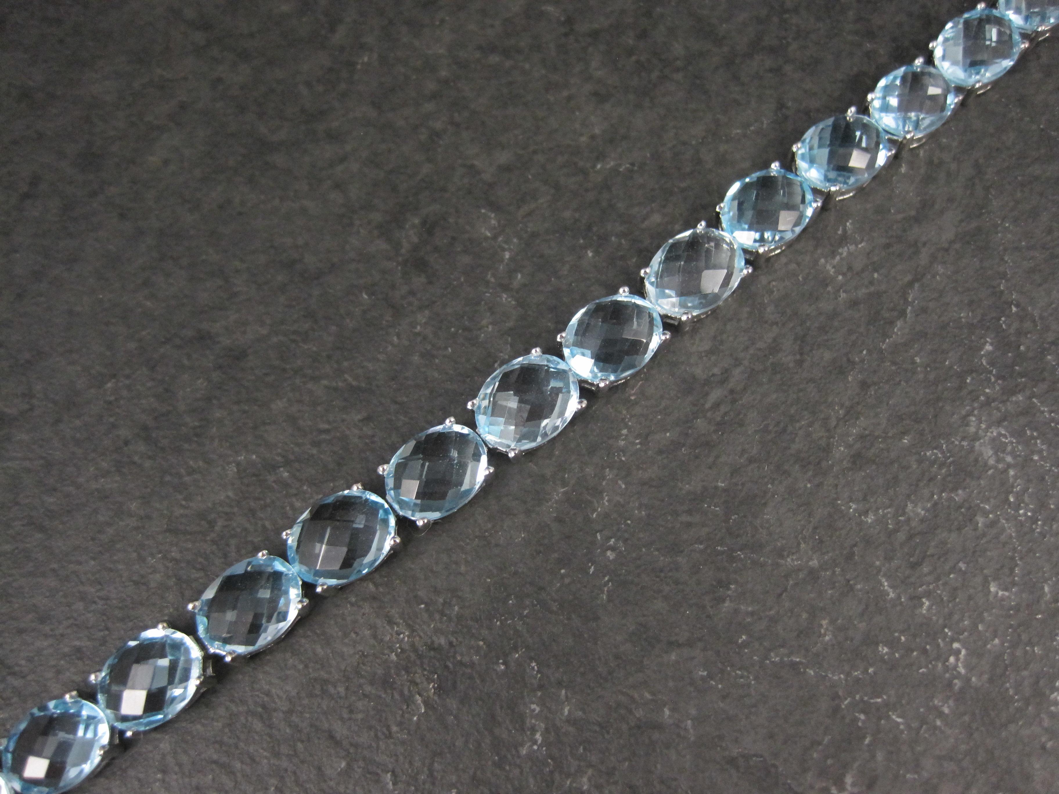 De las mujeres Pulsera de tenis de plata de ley con topacio azul de 45,6 quilates en venta