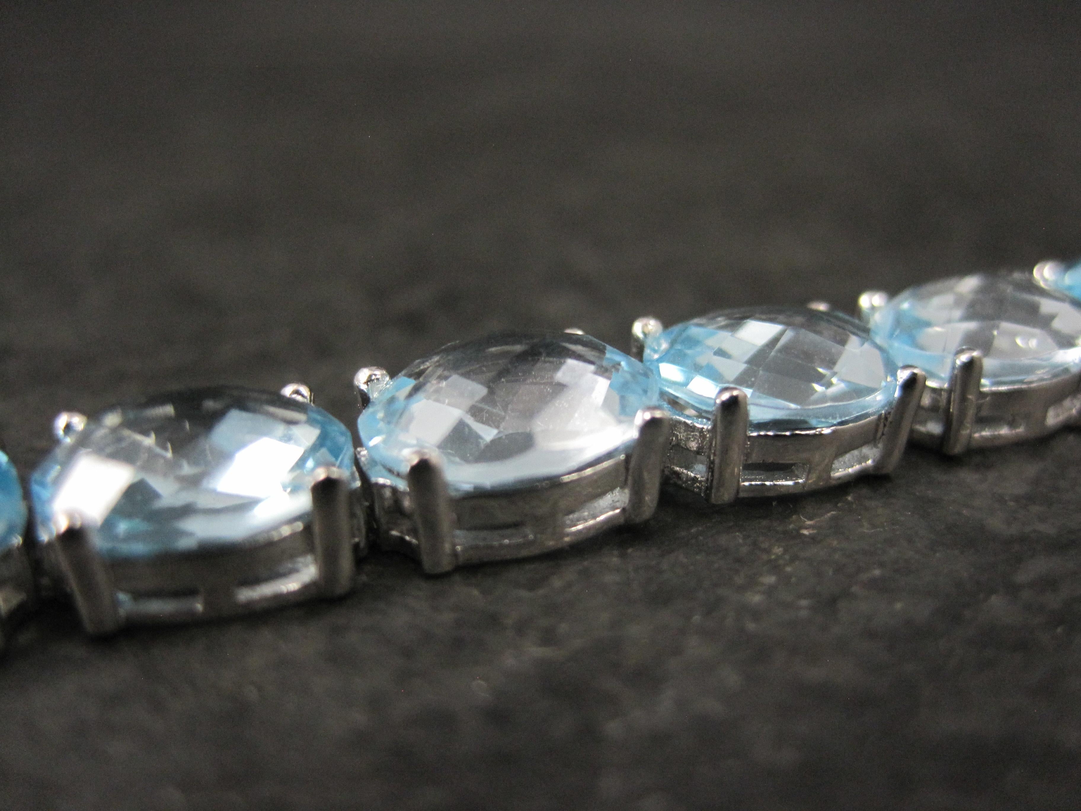 Pulsera de tenis de plata de ley con topacio azul de 45,6 quilates en venta 2