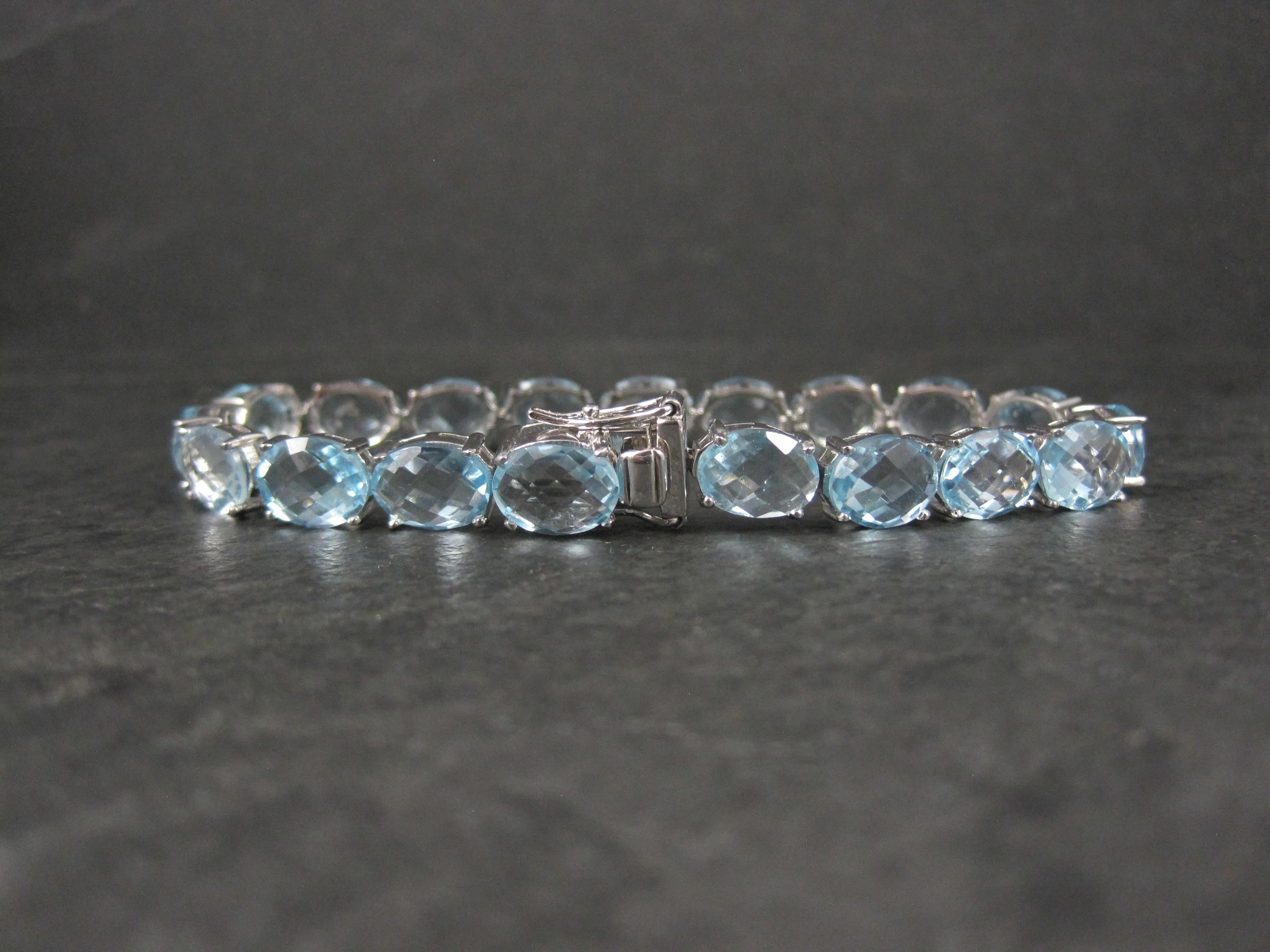 Pulsera de tenis de plata de ley con topacio azul de 45,6 quilates en venta 3