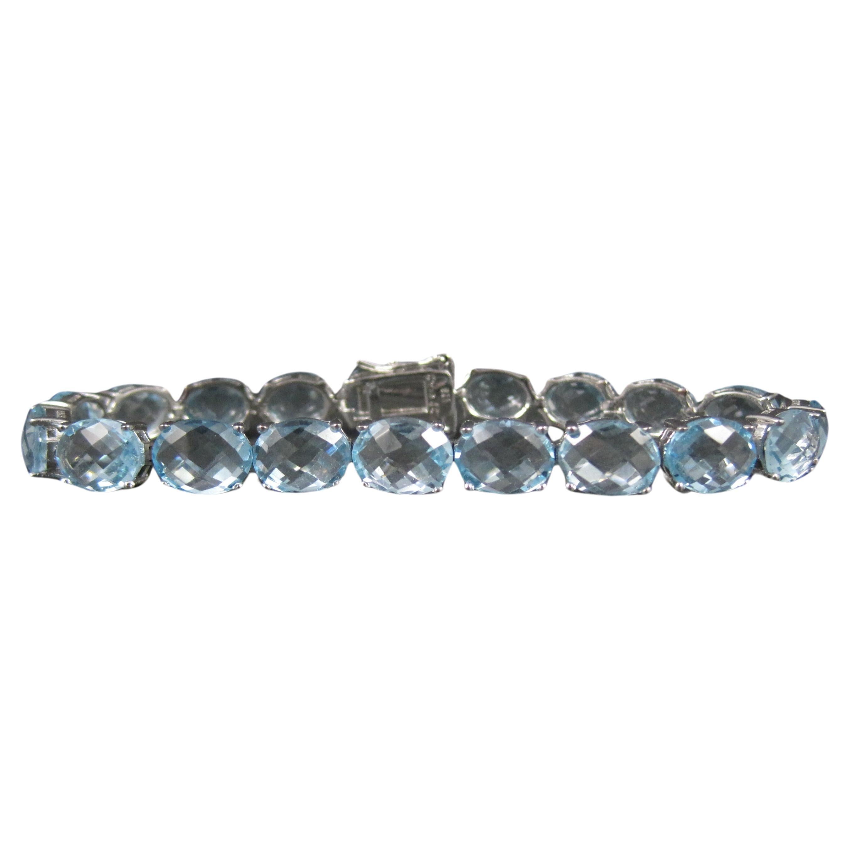Pulsera de tenis de plata de ley con topacio azul de 45,6 quilates
