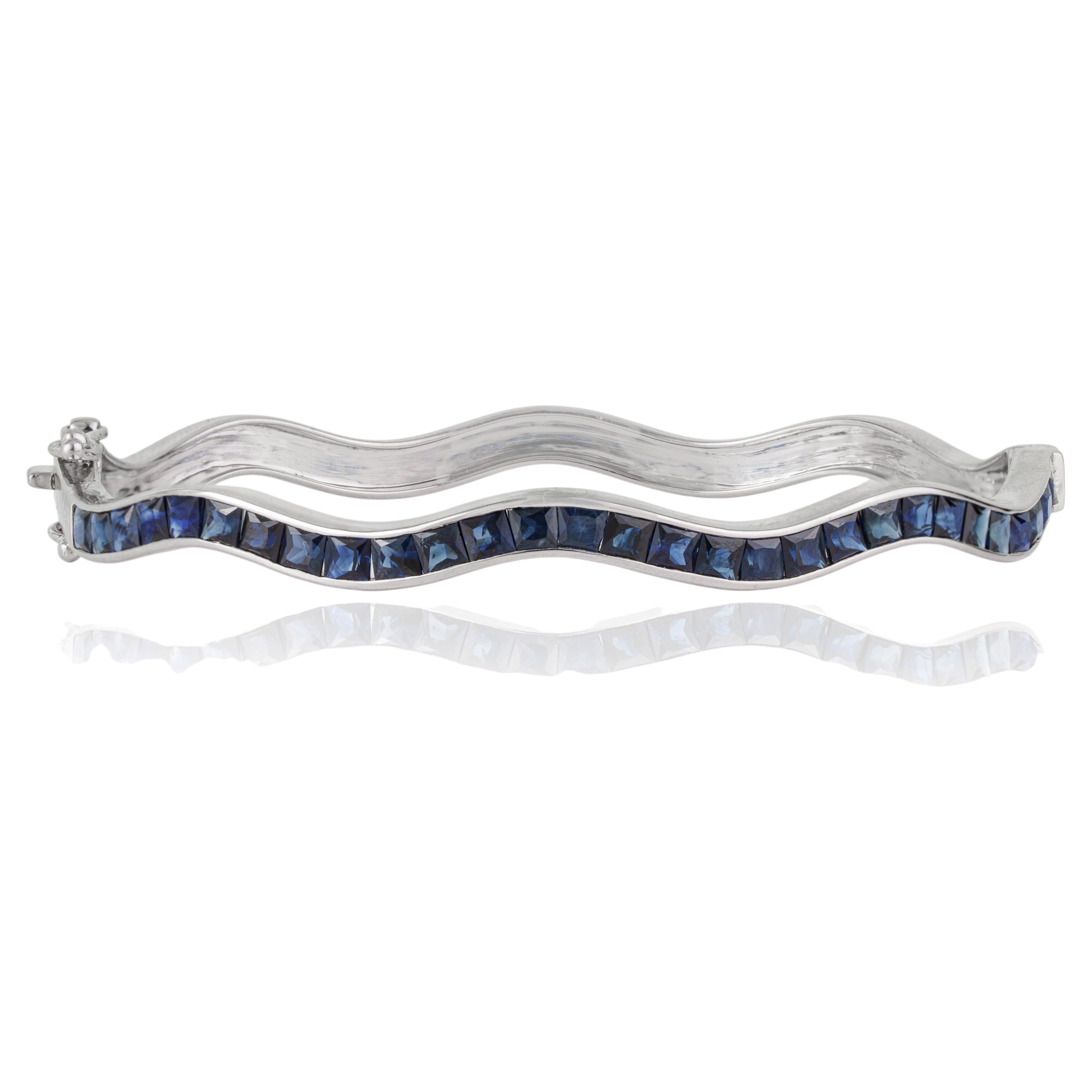 Sterling Silver 4.75 CTW Channel Set Blue Sapphire Hinged Wave Bangle Bracelet
