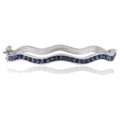 Sterling Silver 4.75 CTW Channel Set Blue Sapphire Hinged Wave Bangle Bracelet