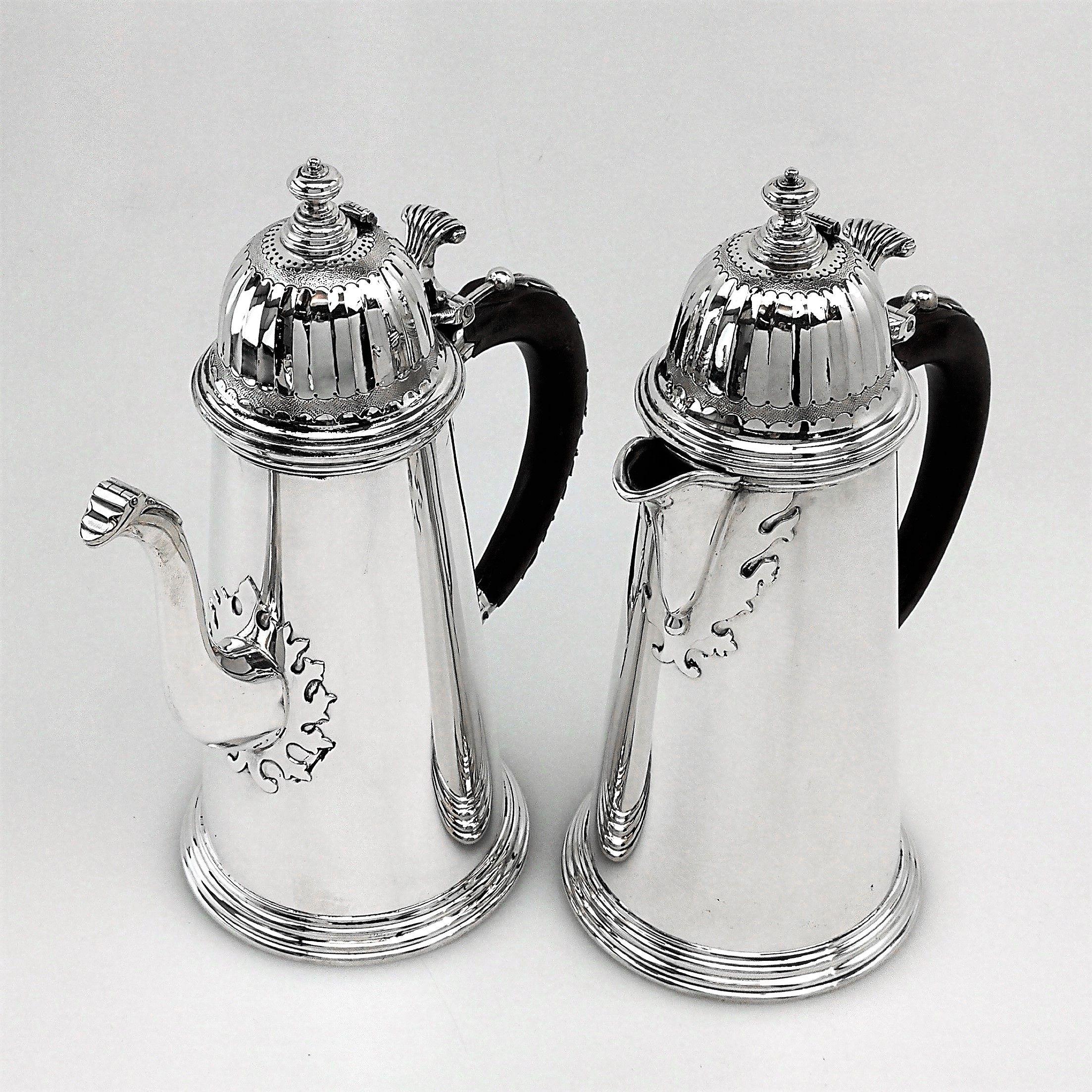 An exceptional vintage sterling Silver Tea and Coffee set designed after the Queen Anne era William Lukin Tea Sets of the same style. This Tea Set comprises of a Teapot, Coffee Pot, hot Water Jug, Sugar Bowl Jug. The teapot, coffee pot & hot water