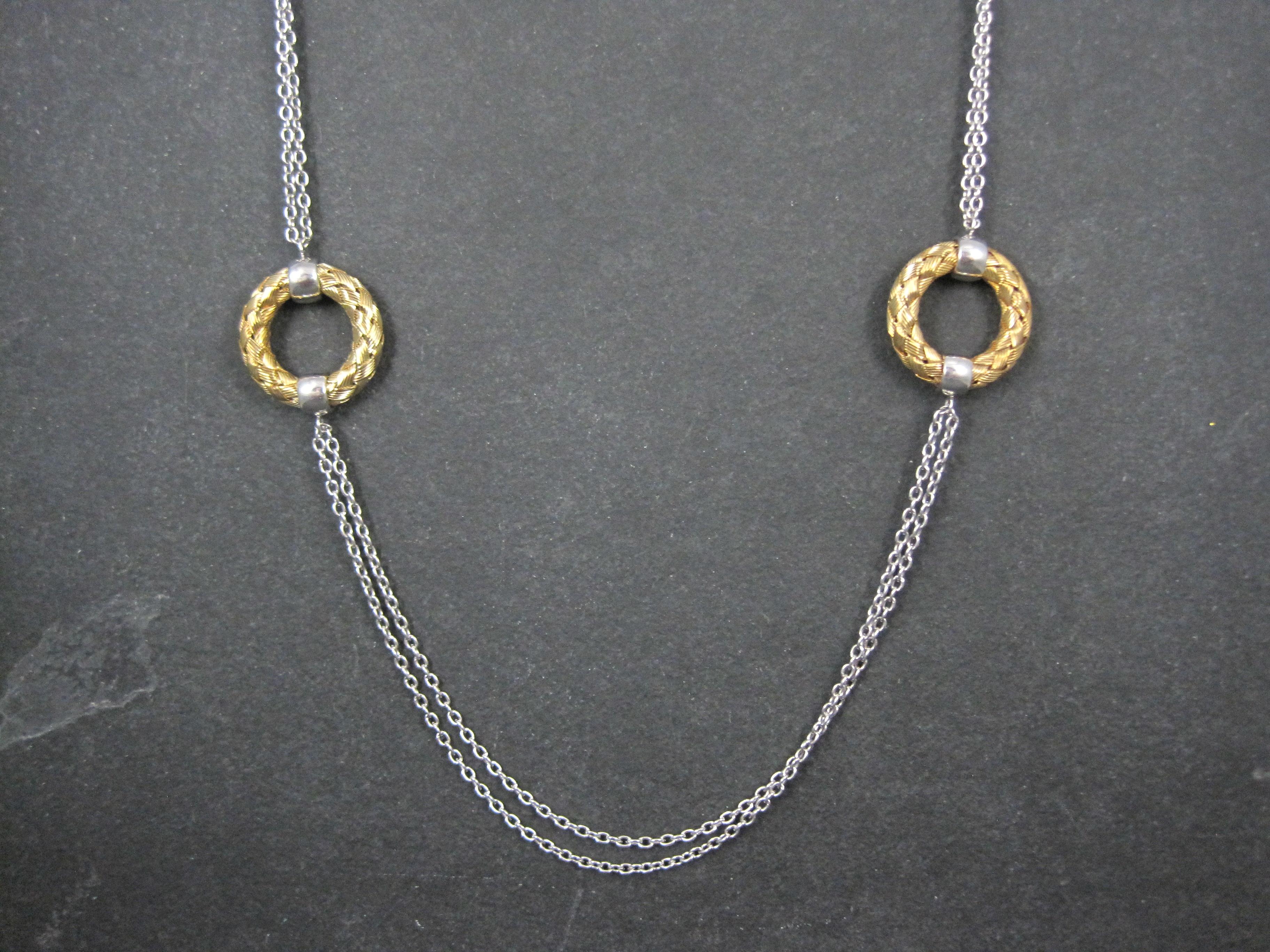 Chic 1 inch circles are stationed along this contemporary necklace by The Fifth Season by Roberto Coin.

Designed in a combination of 18k gold vermeil and sterling silver, this necklace is 39 inches and can be styled in a multitude of ways.
Weight: