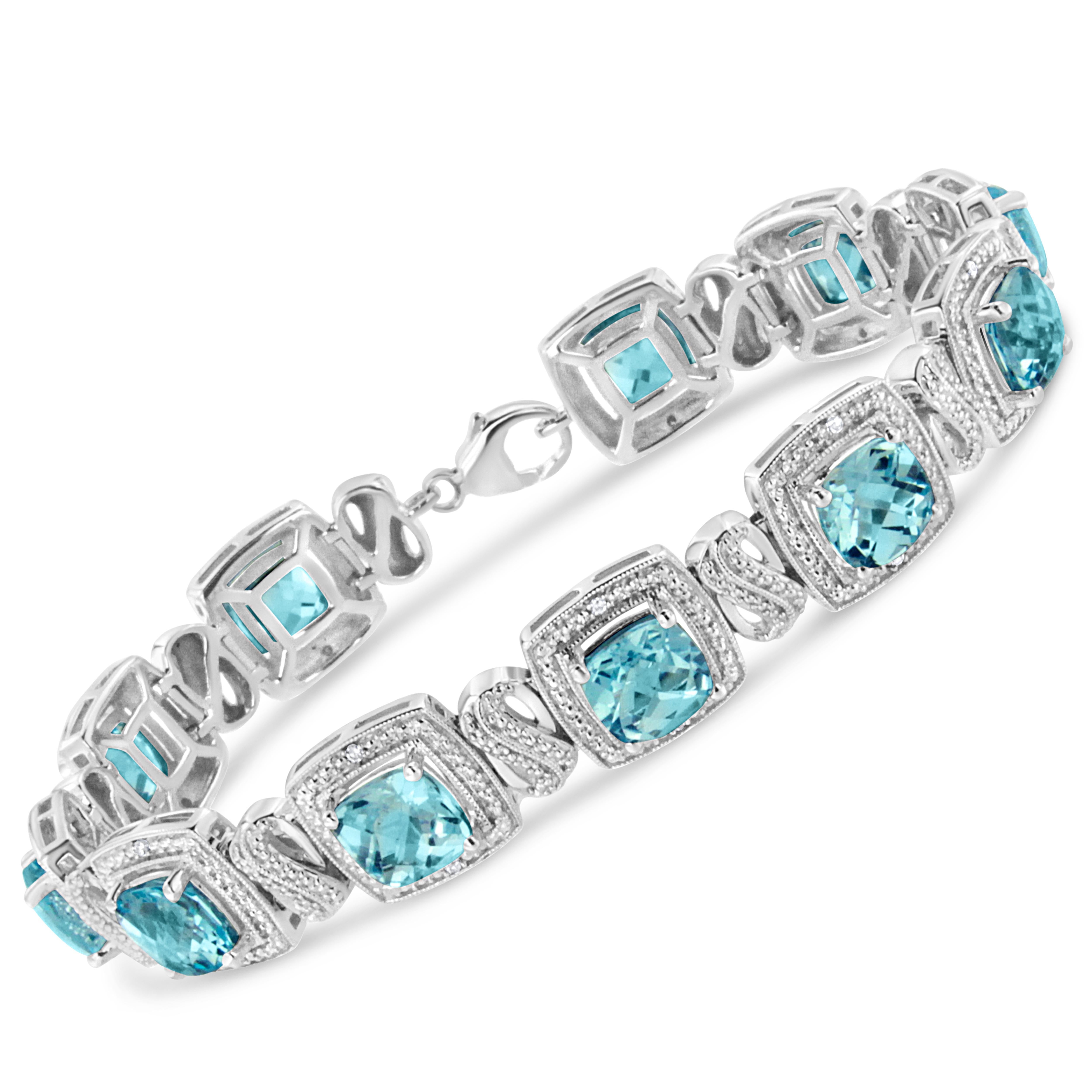 Make a glistening fest for your sweetheart's wrist with this sparkling blue topaz and diamond bracelet. Styled in remarkable sterling silver this square shape bracelet is embellished with 11 alluring prong set cushion cut blue topaz accentuated by