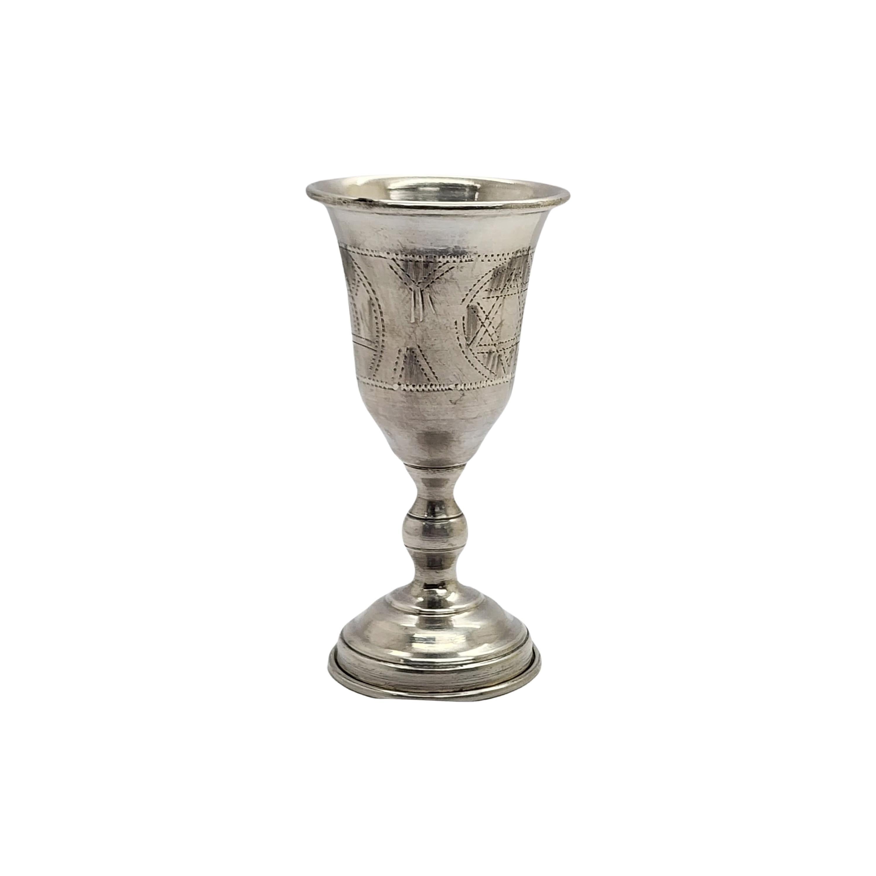 Vintage sterling silver 84 kiddush cup.

No monogram or engraving.

Goblet style cup with beautiful bright cut etched designs around the cup, including The Star of David.

Measures approx 3 1/2