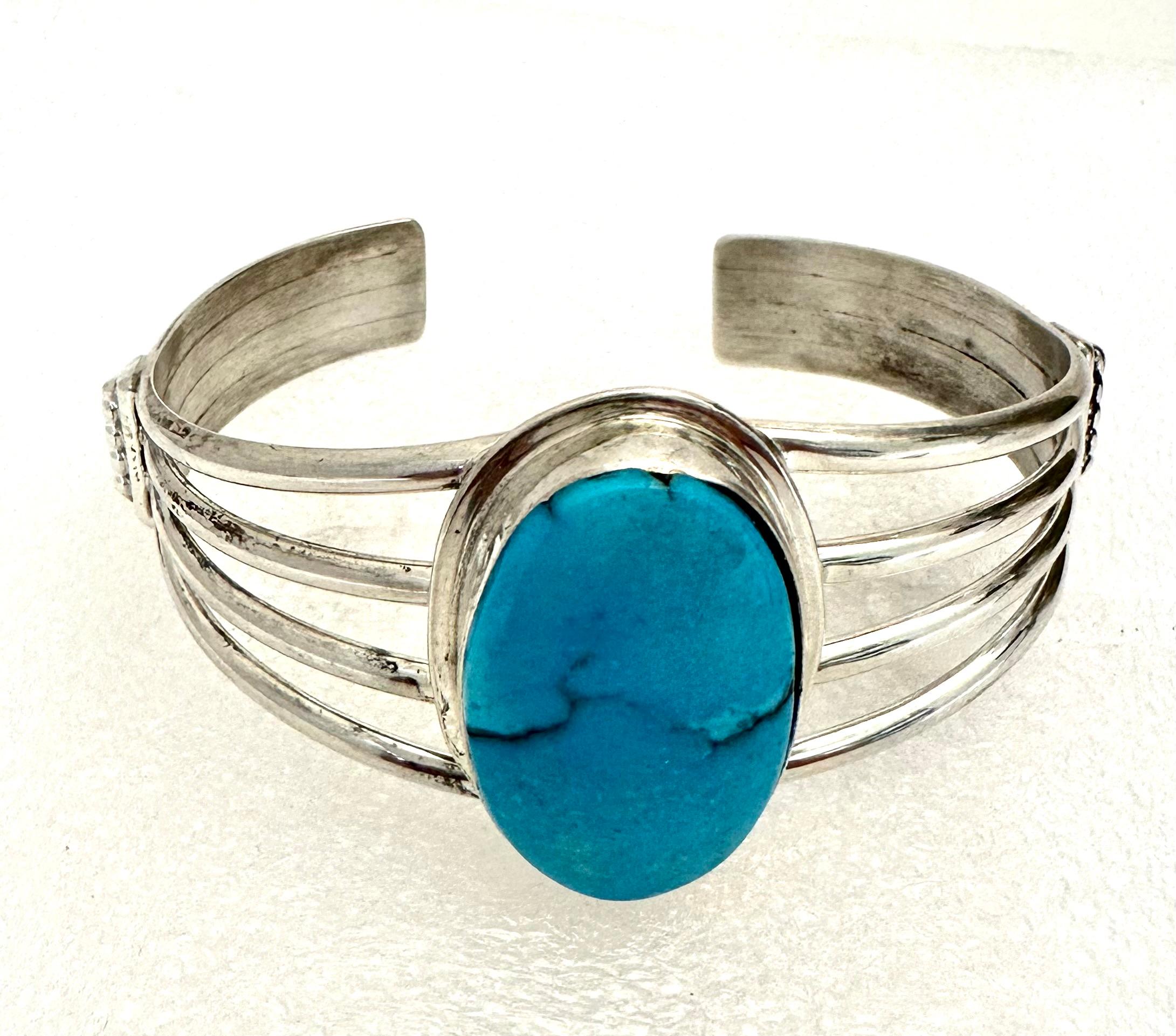 Sterling Silver .925 18mm x 29mm Oval Sleeping Beauty Turquoise Cuff Bracelet

Turquoise, a blend of the color blue and the color green, has some of the same cool and calming attributes. The color turquoise is associated with meanings of refreshing,