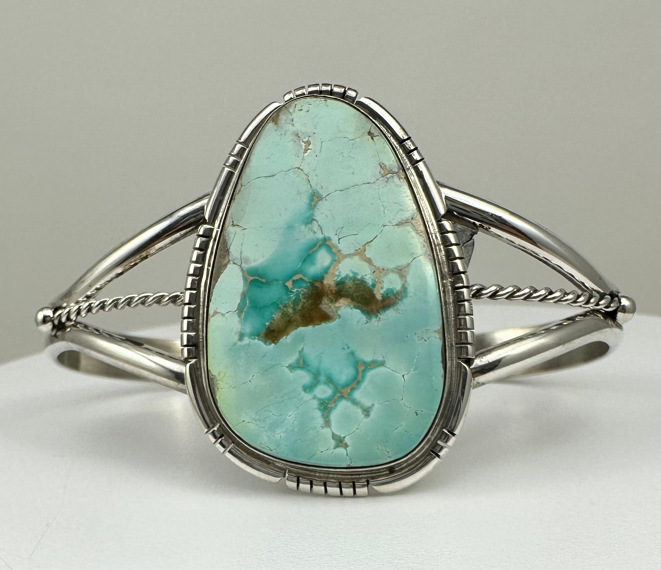 Sterling Silver .925 Kingman Turquoise Cuff Bracelet 
Signed by Navajo Artist by Dave Skeets
Measures approximately:
2 1/2