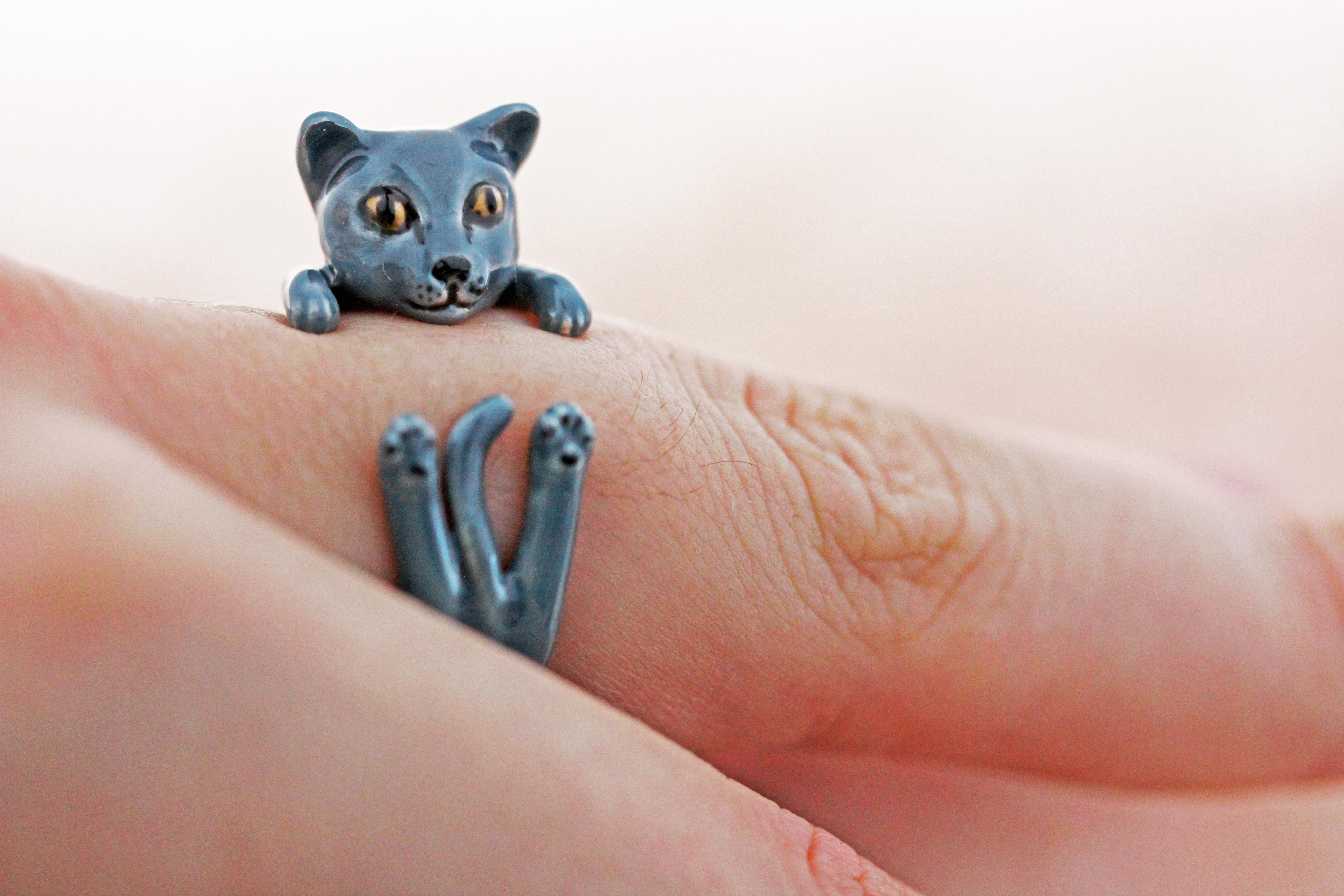 Ring made in sterling silver 925 featuring a grey Cat, thanks to amazing hand enamel life-like features is vividly rendered.   

The AVGVSTA Cat ring is hand made and 100% customizable.  
We offer free engraving-perfect for dog's name or the owner
