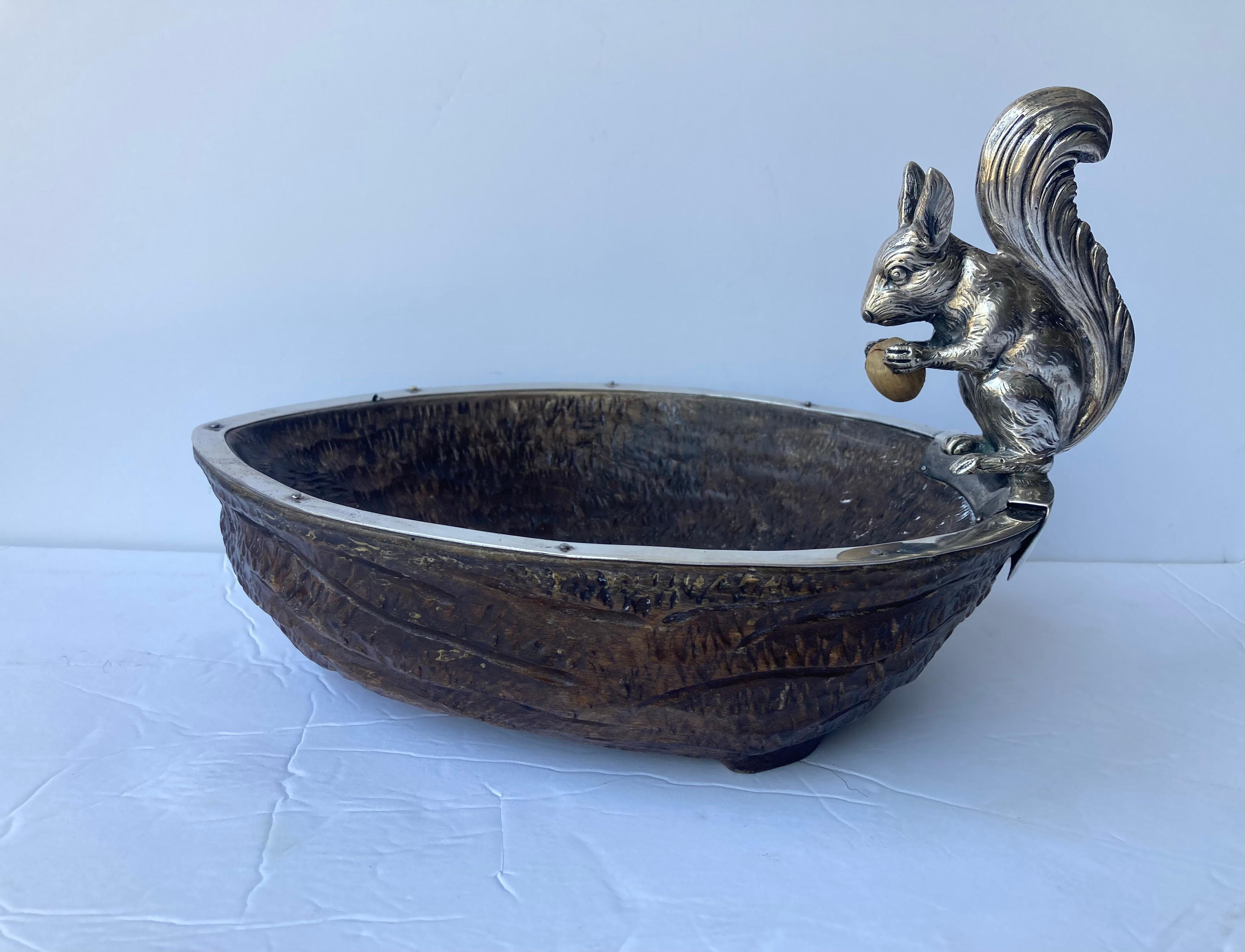 Beautiful nut bowl, made in Germany with wood bowl and sterling silver parts .