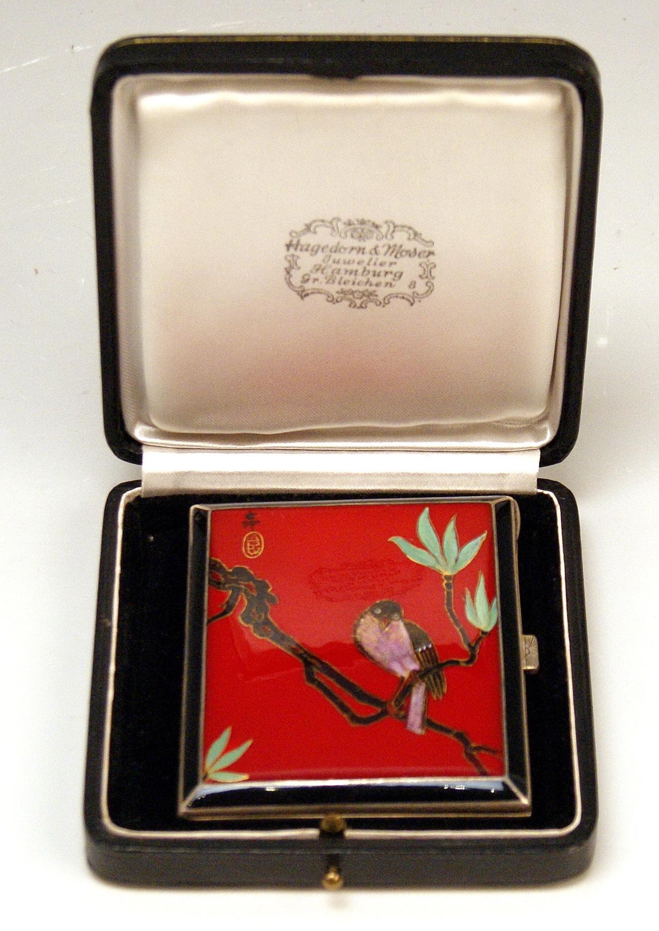 Stunning silver 935 cigarette box / case with enamel painting covering lid:
View of lovely bird has taken place on sprig.

The lid is decorated with a most interesting enamel picture as mentioned above:
There is a bird situated on a leafy bamboo