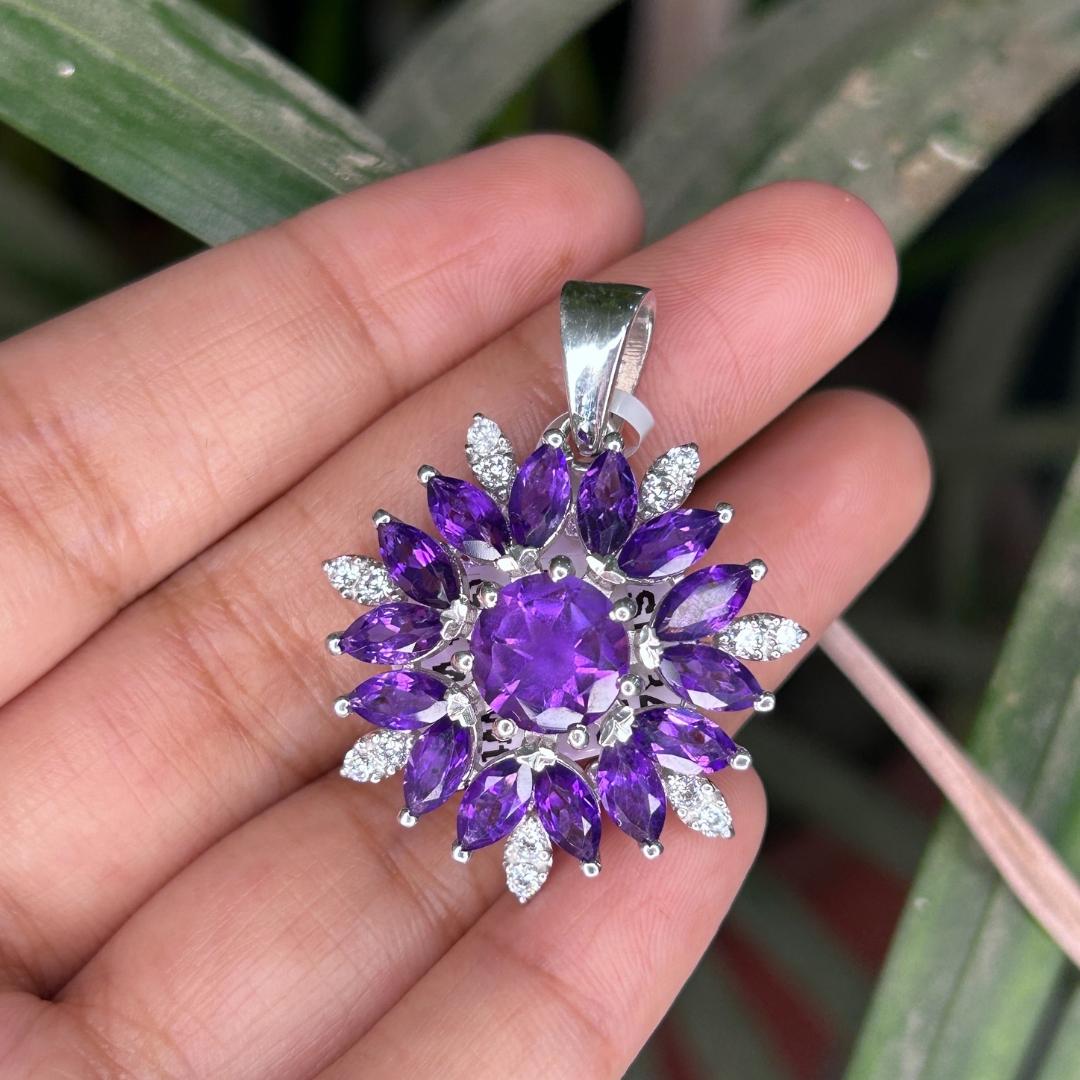 9.9 Carats Amethyst Gemstone Halo Pendant Necklace for Her in sterling silver studded with marquise, round cut amethyst. This stunning piece of jewelry instantly elevates a casual look or dressy outfit.
Amethyst enhances the intellectual capacity of