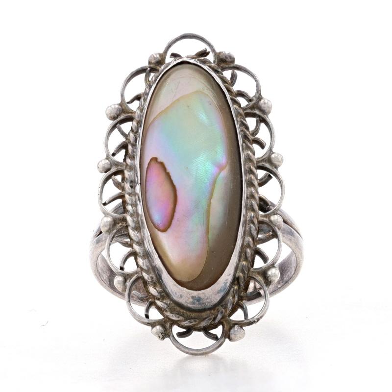 Size: 5 1/2
Sizing Fee: Down 1 size or up 2 sizes for $30

Metal Content: 925 Sterling Silver

Stone Information

Natural Abalone

Style: Cocktail Solitaire
Features: Scallop lace detailing with split shoulders & rope-textured