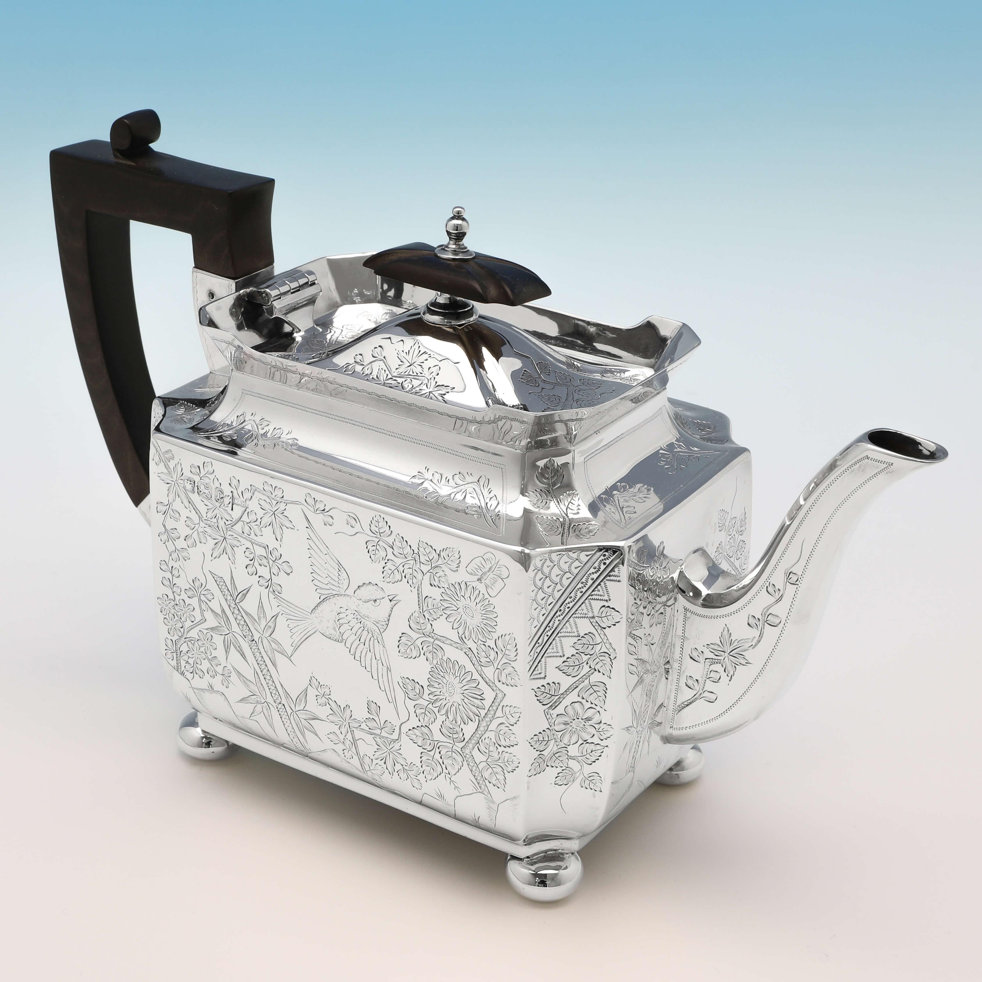 Hallmarked in Sheffield in 1895 by Walker & Hall, this exquisite, Victorian, antique sterling silver 3 piece tea set, is in the Aesthetic style, featuring wonderfully engraved decoration throughout. The teapot measures 6.25