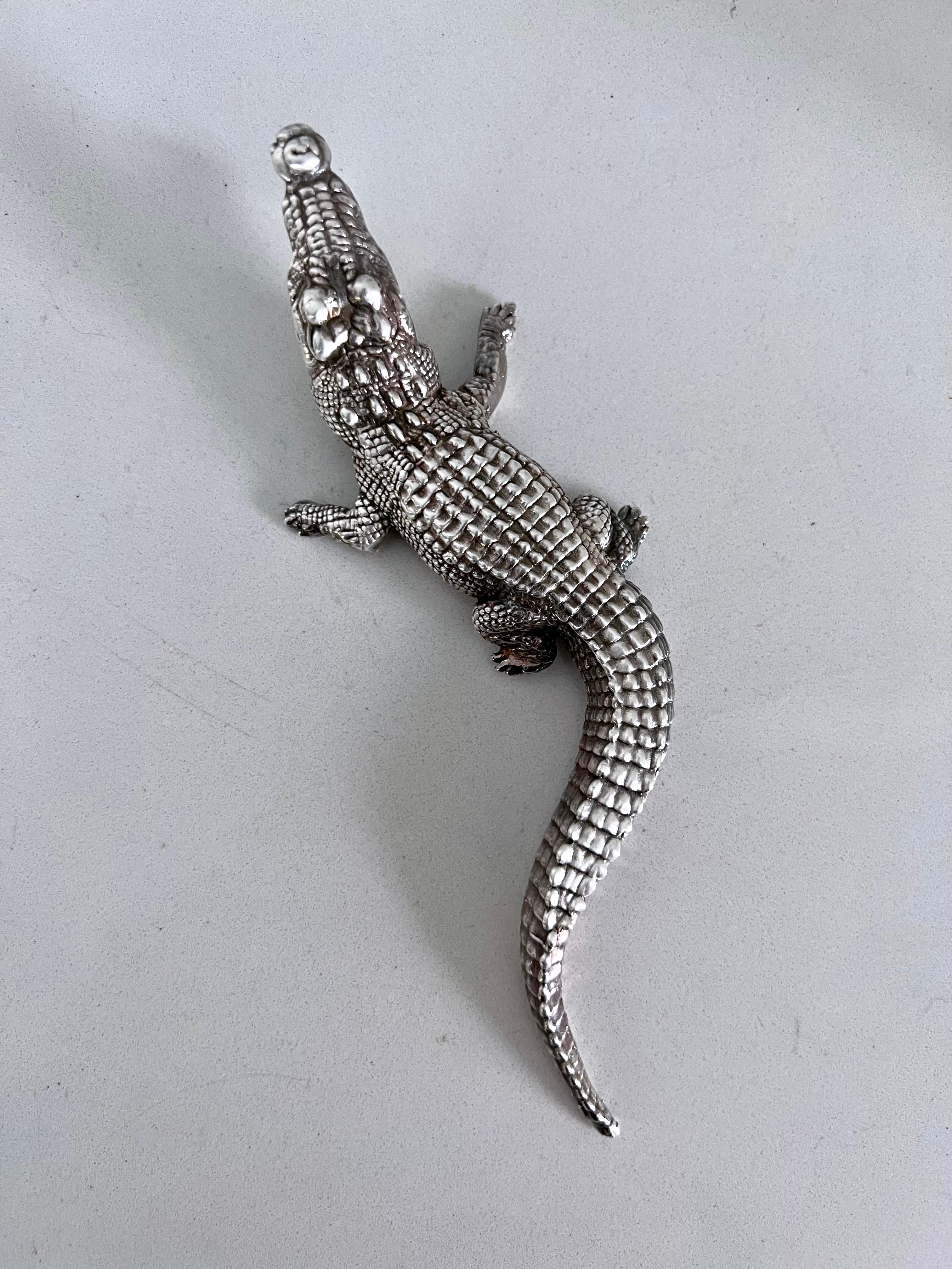 Sterling silver alligator made in Israel. 

Alligators symbolize ancient wisdom, primal instincts and good fortune. 

Body is 1