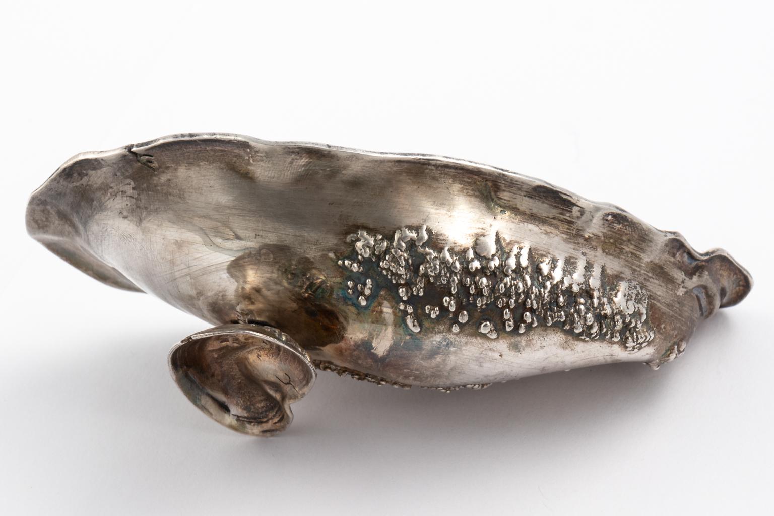 Sterling silver almond dish in the shape of a large oyster shell with barnacles by Gorham Narragansett, circa early 20th century.
 