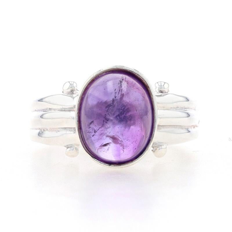 Size: 6 3/4

Metal Content: 925 Sterling Silver

Stone Information

Natural Amethyst
Carat(s): 2.40ct
Cut: Oval Cabochon
Color: Purple

Total Carats: 2.40ct

Style: Solitaire 
Features:  Ribbed detailing

Measurements

Face Height (north to south):