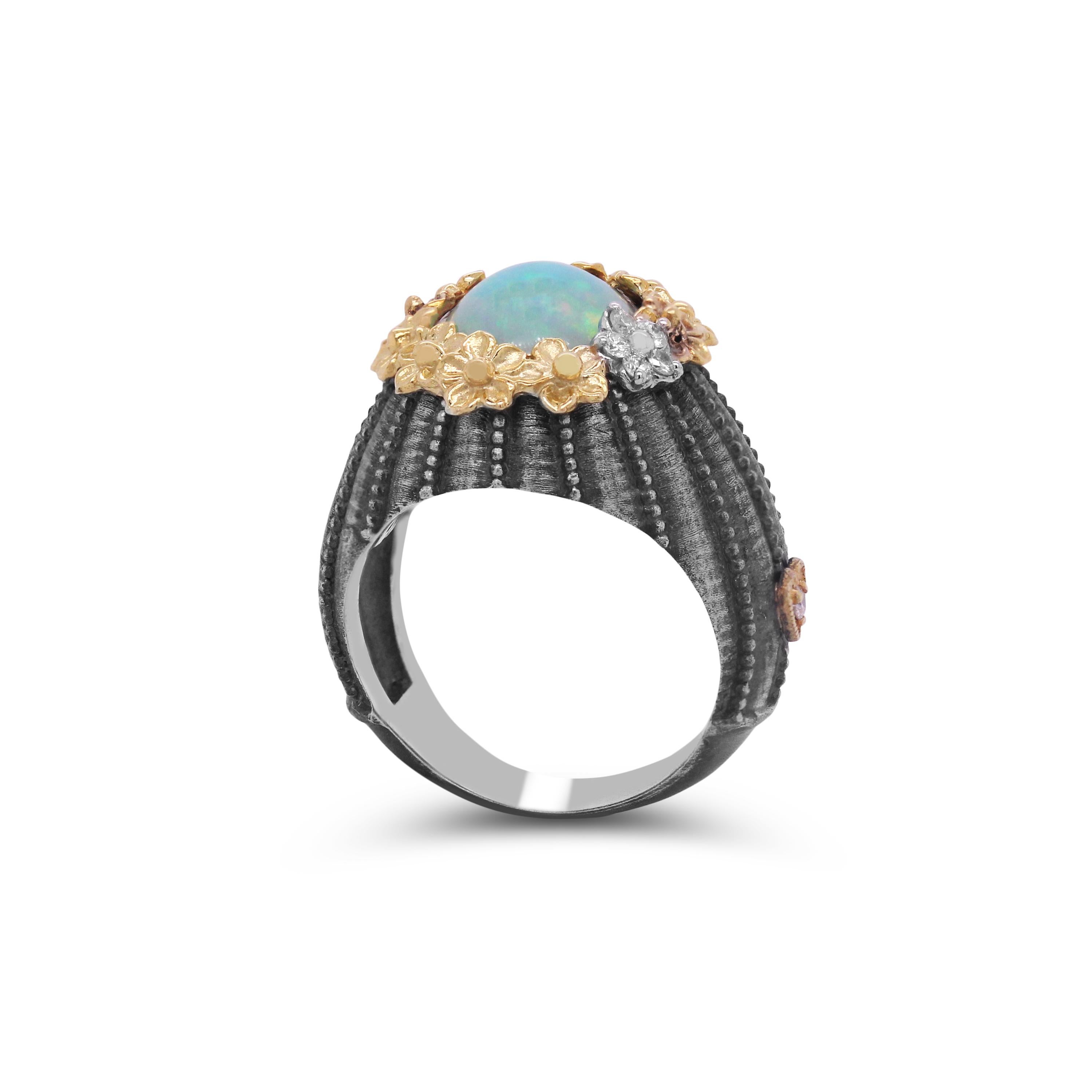 Aged Sterling Silver & 18K Gold Floral Ring with Ethiopian Opal center and Diamonds by Stambolian

This ring from the Stambolian 