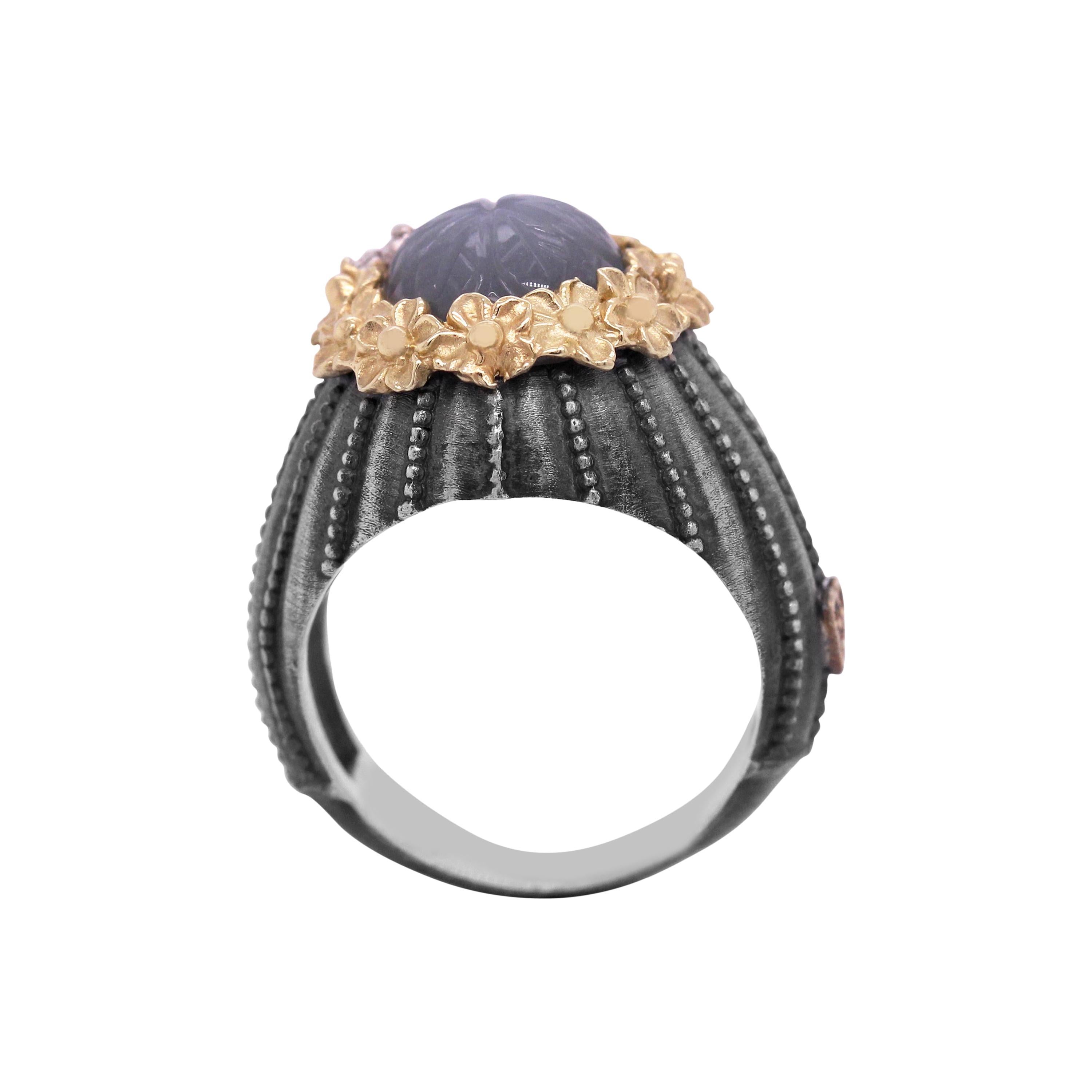 Aged Sterling Silver & 18K Gold Floral Ring with Flower Carved Grey Moonstone center and Diamonds by Stambolian

This ring from the Stambolian 