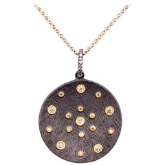 Sterling Silver and 18 Karat Yellow Gold Bezel Set Diamond Disc Necklace