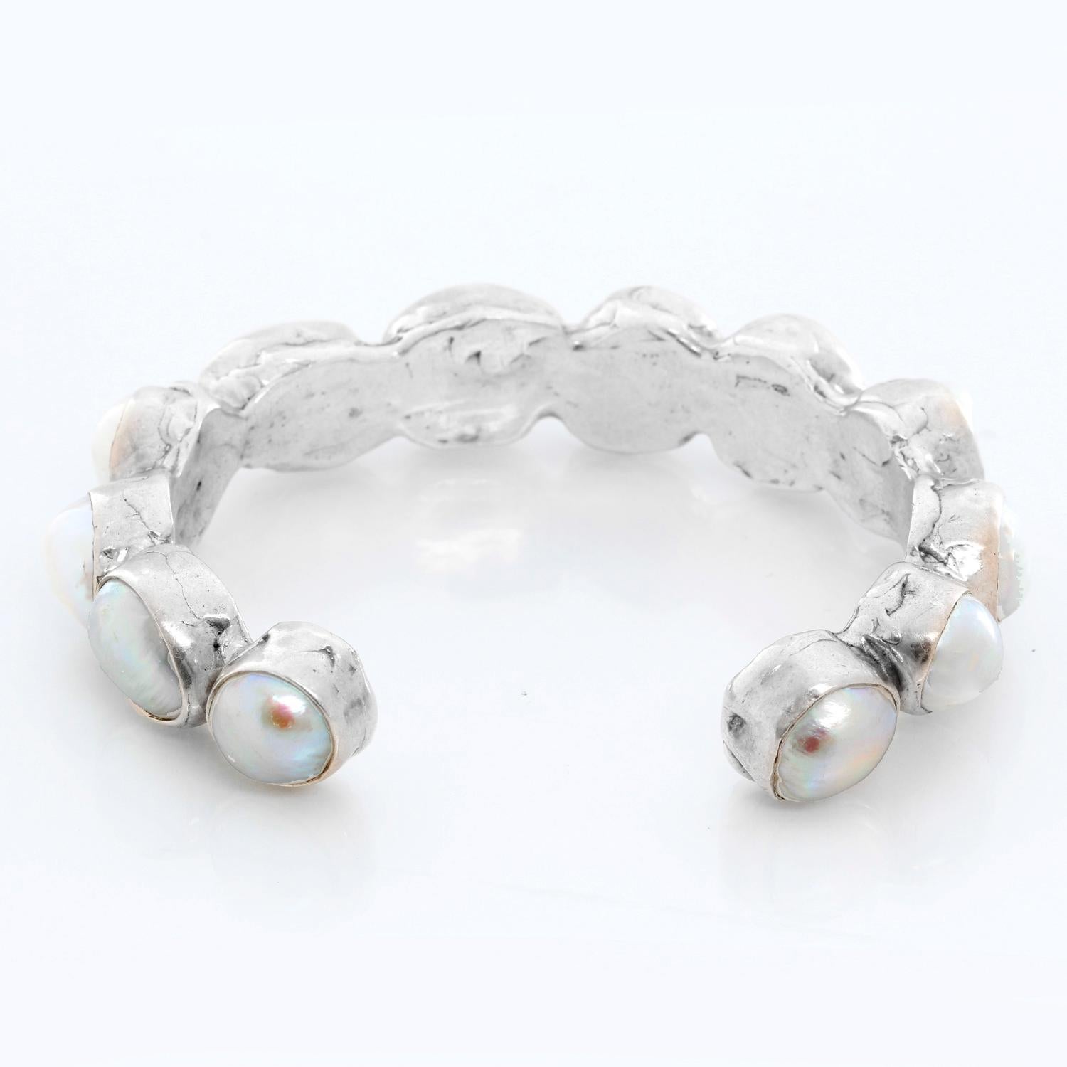 Sterling Silver and Baroque pearl Cuff  - Beautiful sterling silver cuff with 12 baroque pearls. Cuff size 6.5 inches. Total weight 52.6 grams .