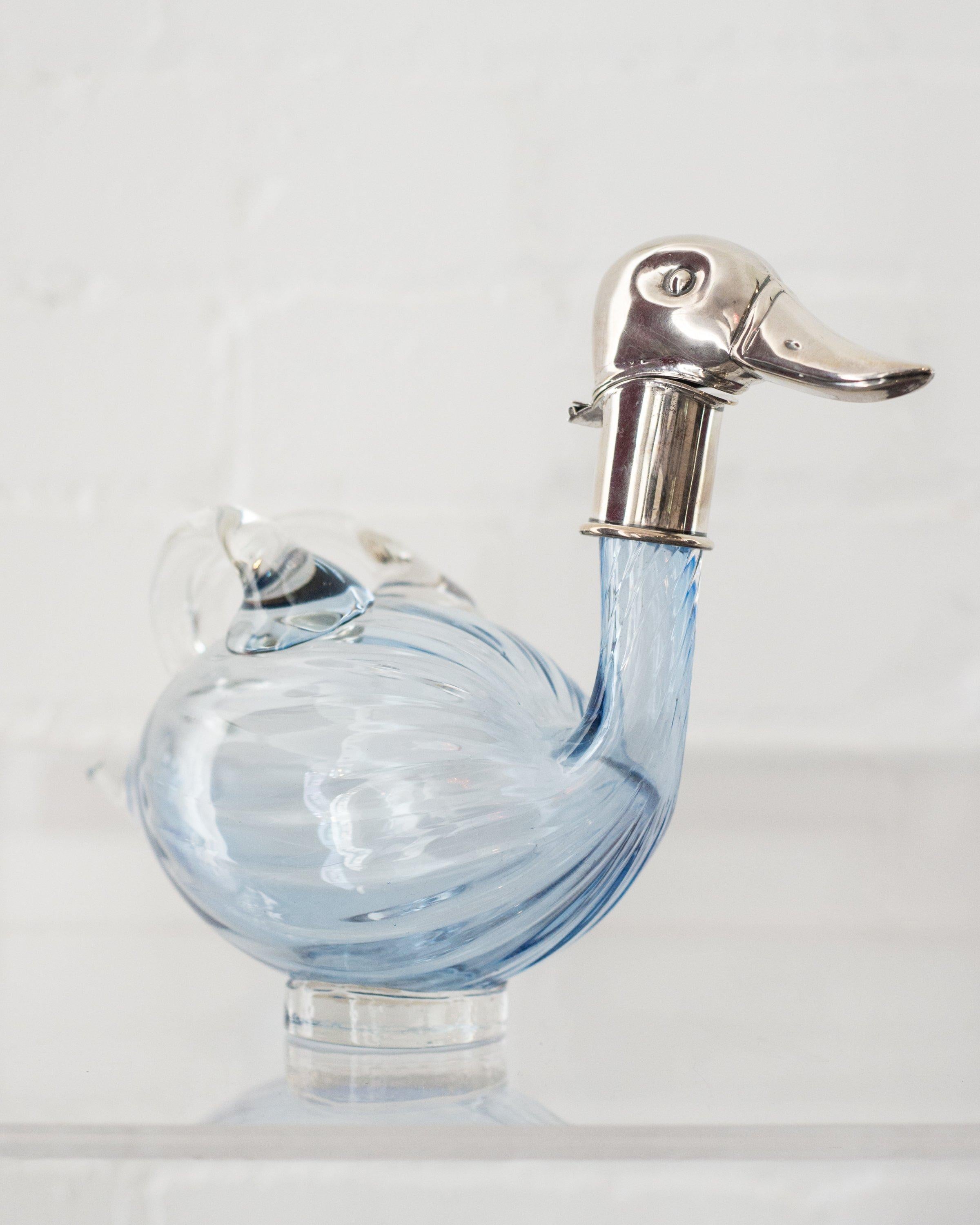 Start the night by pouring a glass of wine from this unusual Austrian sterling silver blue duck decanter. Sterling silver head is hinged at the neck to pour and fill. This conversation piece will enhance any evening with friends.