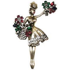 Sterling silver and coloured paste 'flower girl' brooch, Trifari, 1947 , USA