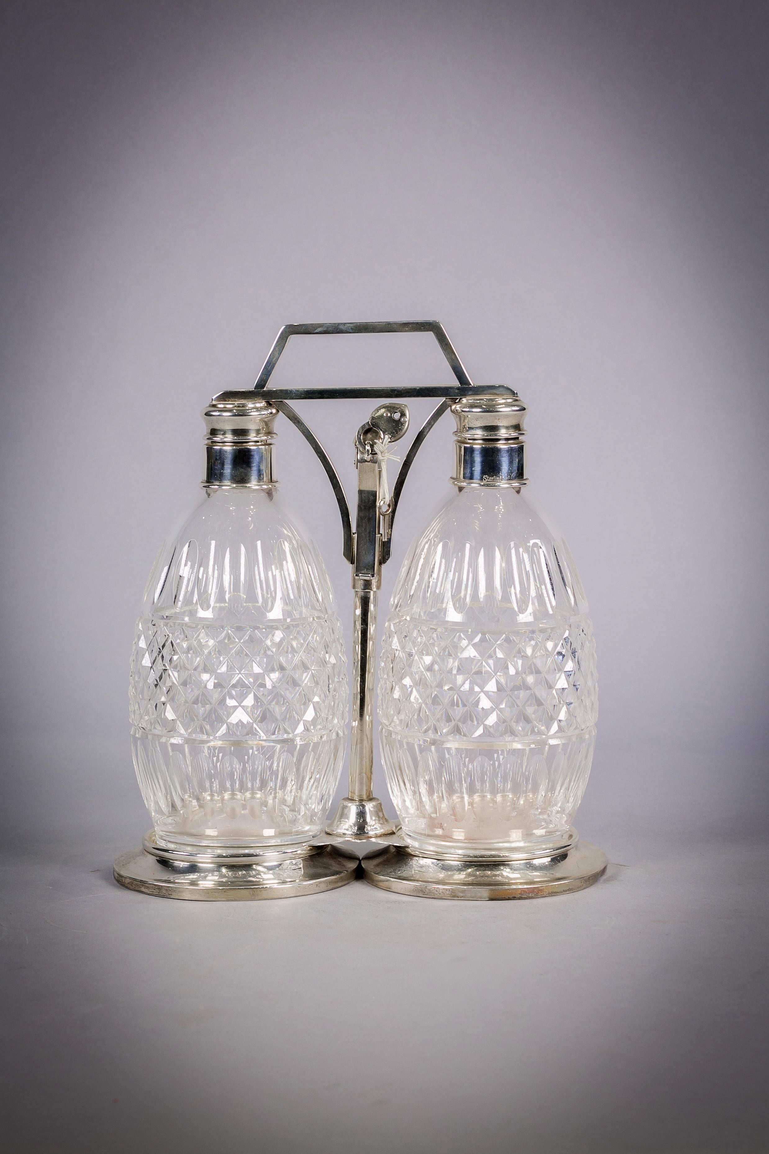 American Sterling Silver and Crystal Two Bottle Tantalus Set, 20th Century For Sale