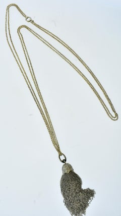 Sterling Silver and Diamond Long Chain Necklace Suspending a Tassel Pendant